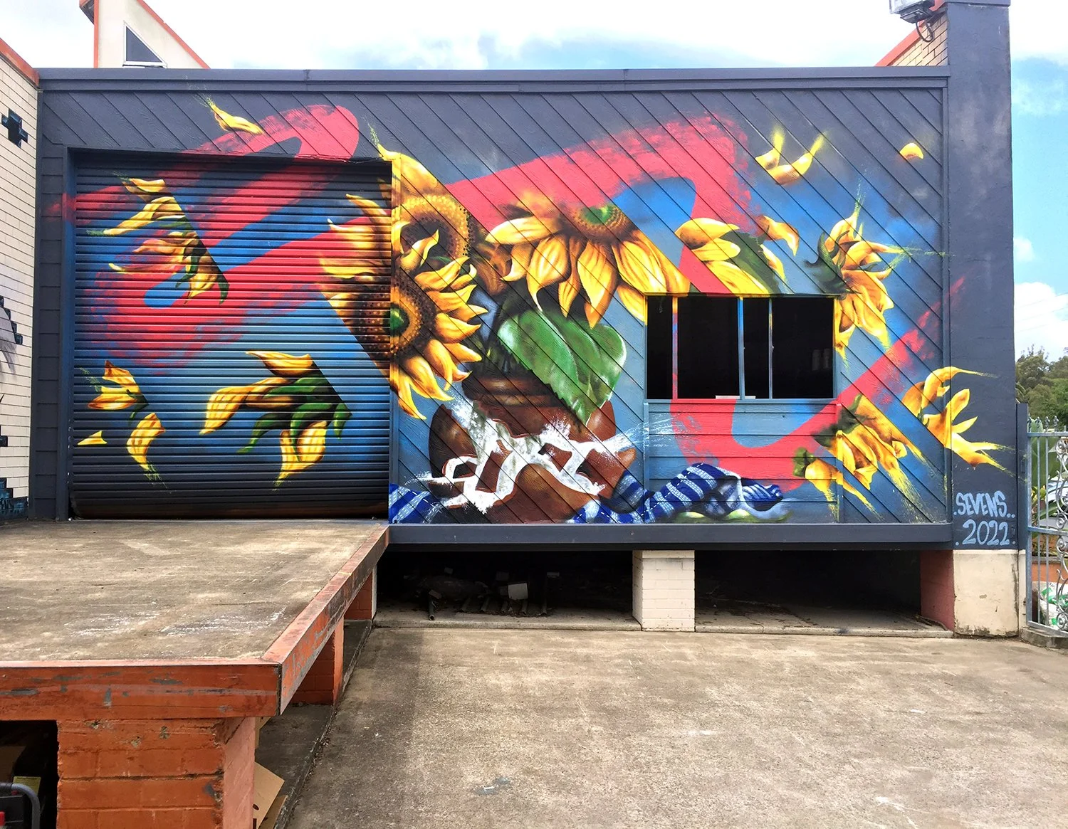 sevens-artist-sunflower-mural