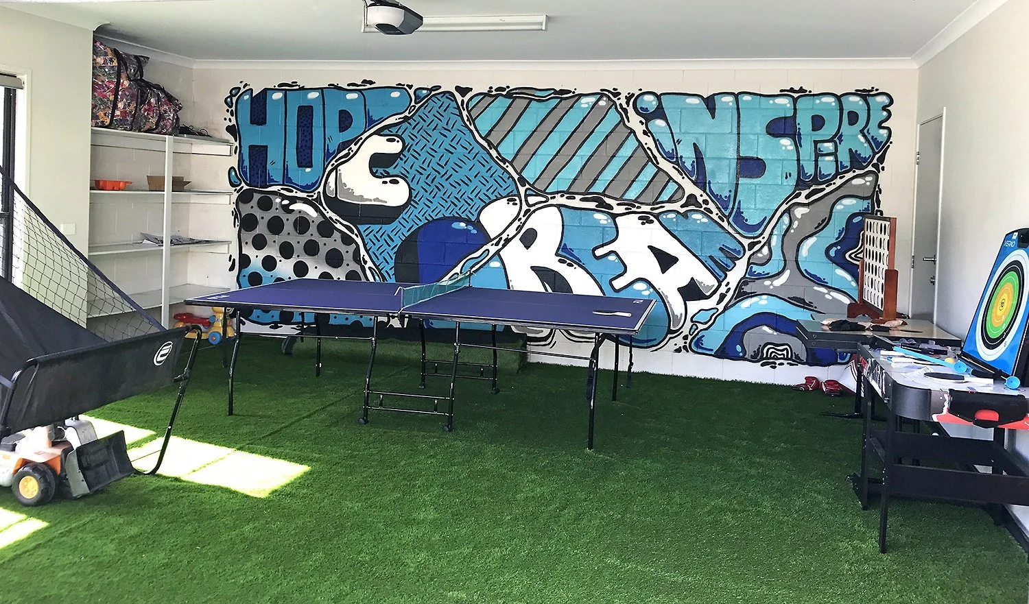 sevens-artist-gfss-gamesroom-mural