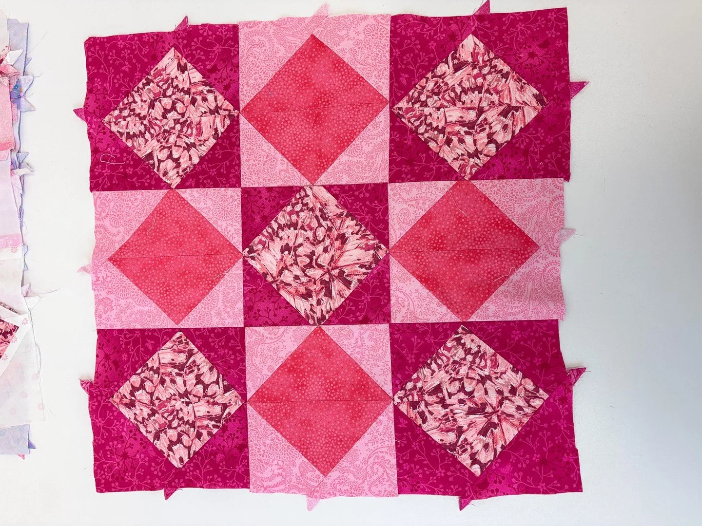 🧵 Quilt progress update!

Our student's quilt project for their great-aunt is coming along beautifully, with 12 squares completed so far.

There are 30 squares to make in total, so we're nearly halfway! He&rsquo;s taking his time and steadily buildi