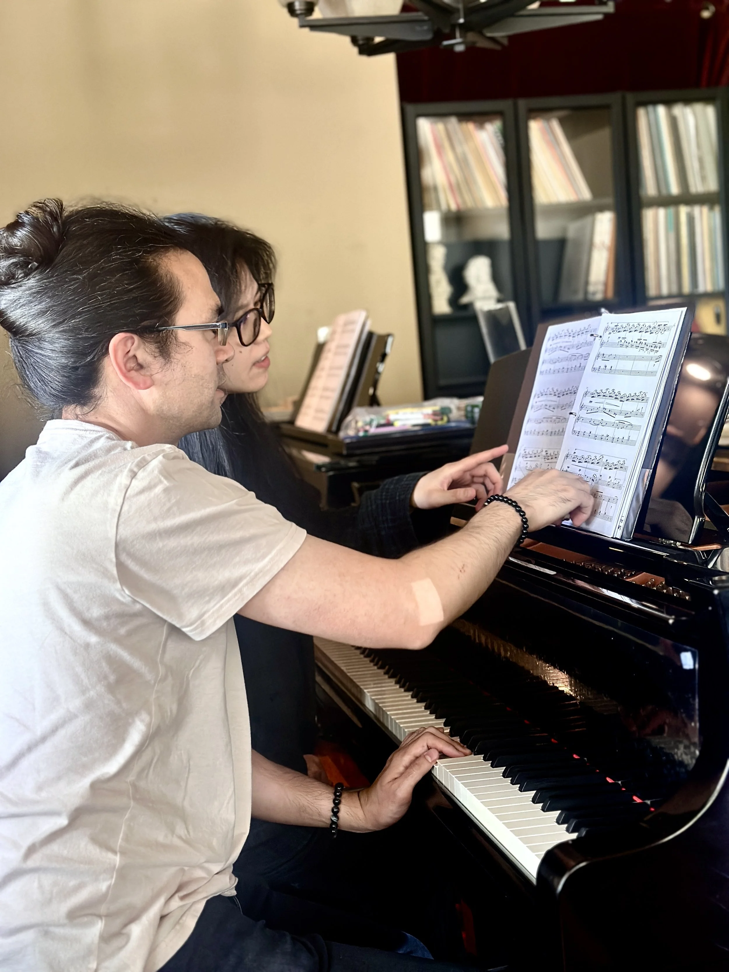 Testing a Four-Hand Arrangement at the Piano