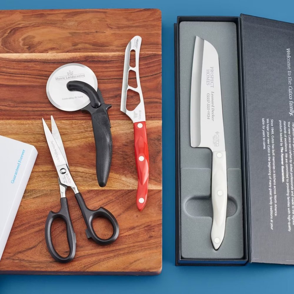 Engraved Cutco closing gifts, including a knife engraved with a realtor's logo, name, and phone number