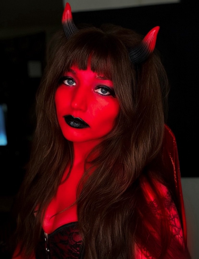 My Halloween look + this sweet Polaroid someone snapped of my husband and I while we waited for our table at dinner for our anniversary + Ozz dog not being thrilled with her costume and taking matters into her own hands 👹❤️&zwj;🔥