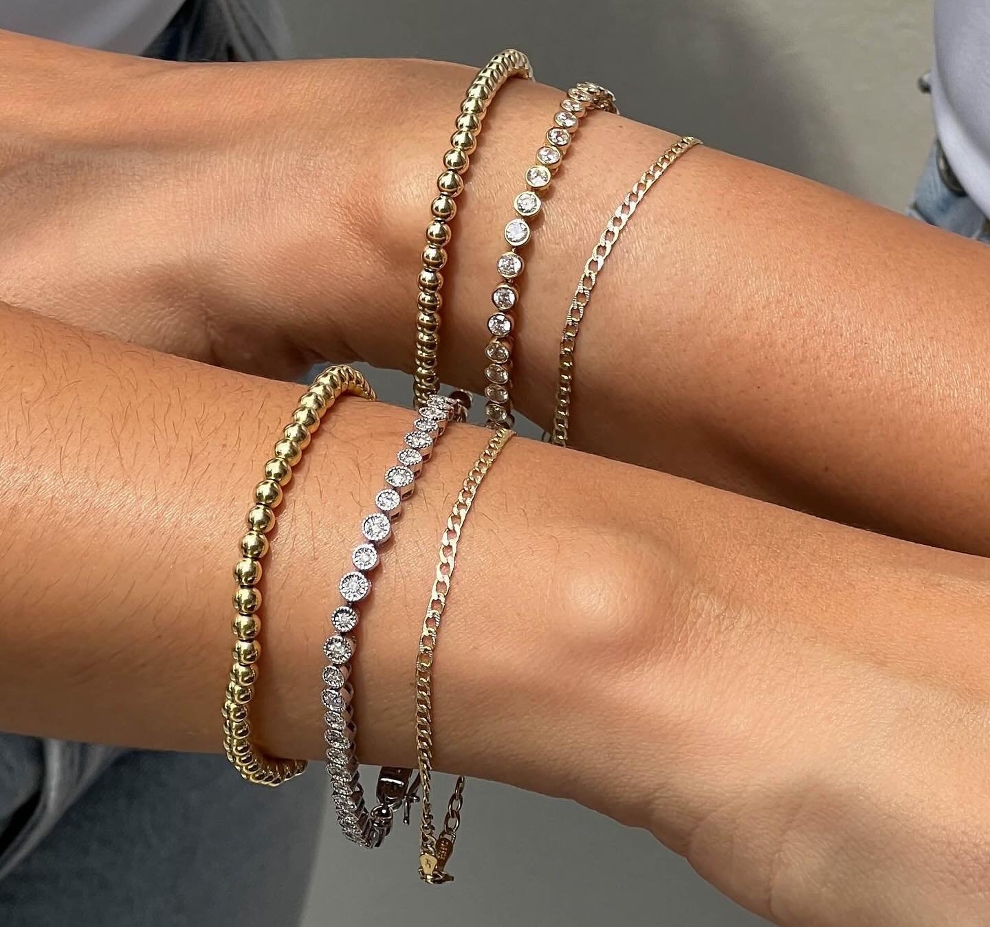 Same style, different energy. 🩶✨⁠
⁠
The White Tennis Bracelet vs. the Gold Tennis Bracelet&mdash;who are you today?⁠
.⁠
.⁠
#DeNocheJewels⁠
#JewelryDesigner⁠
#EverydayJewelry⁠
#MinimalJewelry⁠
#JewelryLover⁠
#MixedMetals⁠
#LayeredJewelry⁠
#JewelryTre