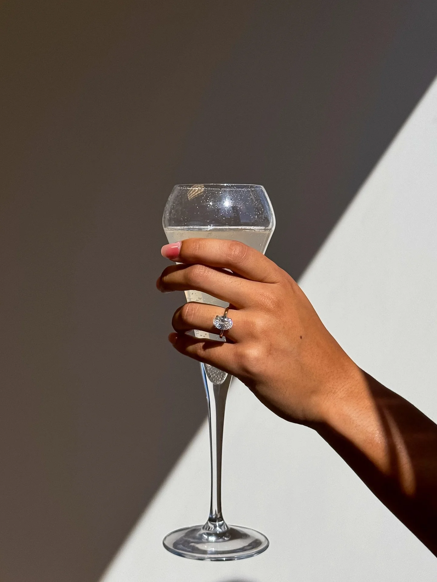 A toast to forever. 🥂⁠
⁠
Engagement rings by De Noche.⁠
.⁠
.⁠
#DeNocheJewels #EngagementRings #ProposalSeason #WeddingRings #DiamondRing #JewelryDesigner #EverydayJewelry #MinimalJewelry #JewelryLover #MixedMetals #LatinaOwned #SmallBusiness #Jewelr