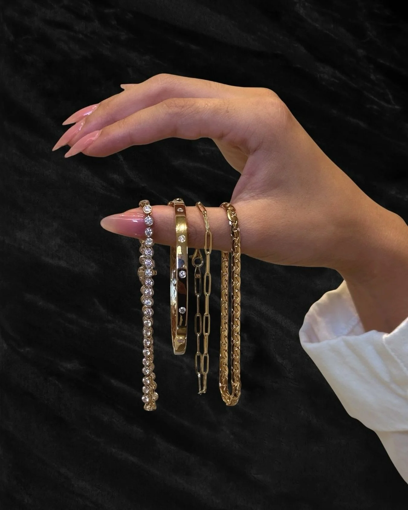 A stack that speaks for itself ✨
Timeless bracelets designed to layer, love, and live in

link in bio to shop
.
.
.
#stackedbracelets #houstonjeweler #finejewelry #giftsforher