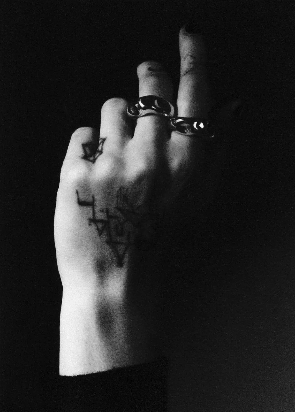  What is in your hand, Hunter’s hand wearing ‘Du Métal’ Ring, 2026, photography by Tessa  Belle Dillman 