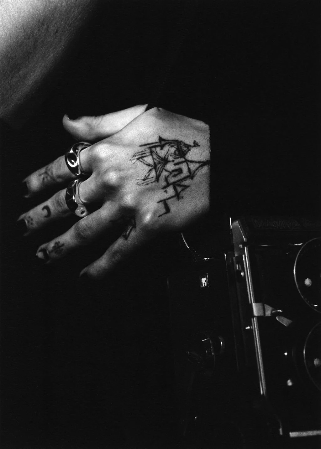  What is in your hand, Hunter’s hand wearing ‘Du Métal’ Ring, 2026, photography by Tessa  Belle Dillman 