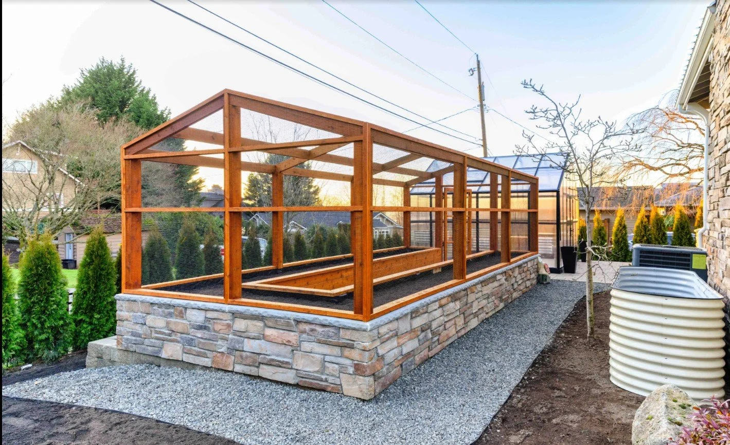 Greenhouse and stone siding