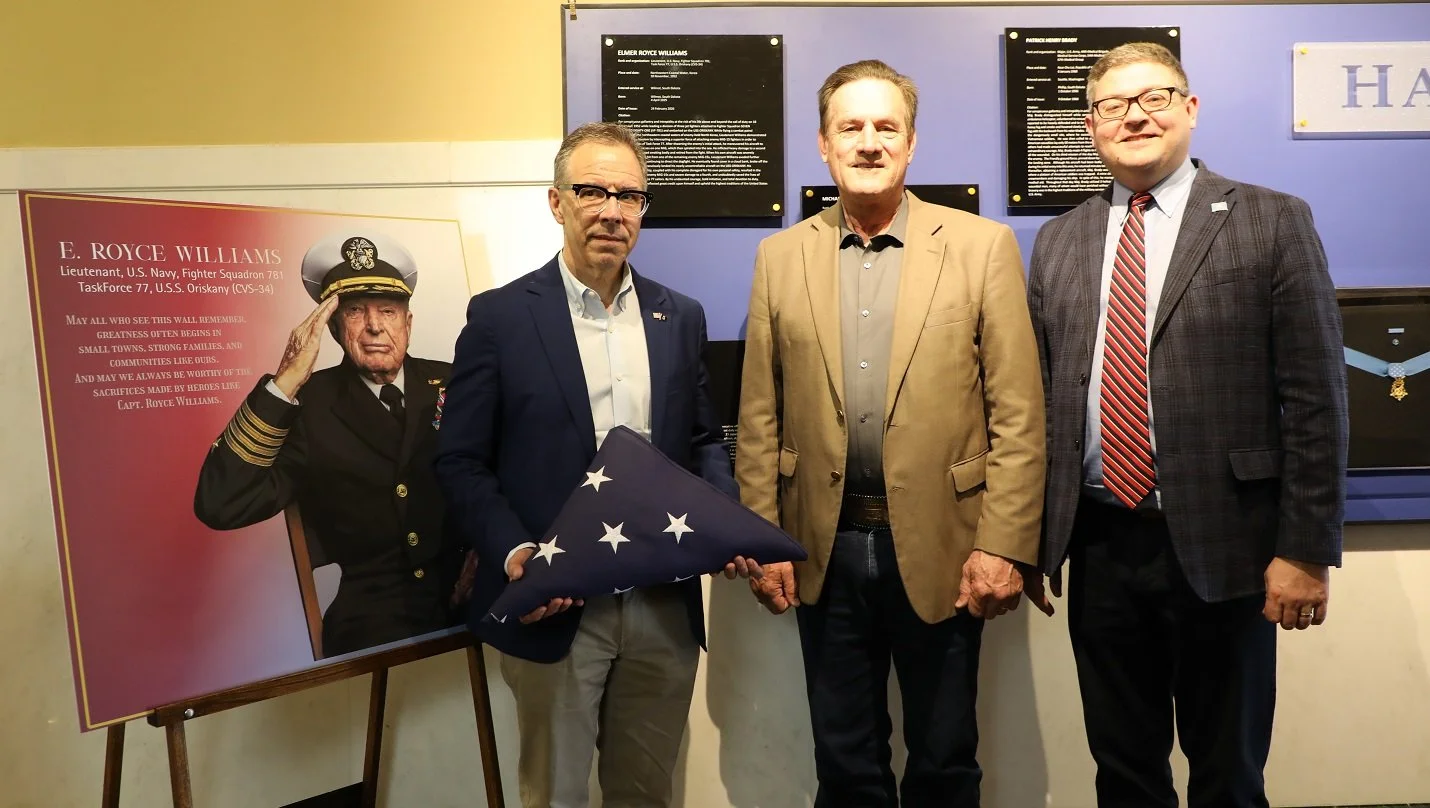 I am a living Forest Gump - here's me with SD Governor Rhoden and Lt. Governor Veldhuizen receiving the USA flag on behalf of MOH recipient Royce Williams.   I'm not worthy - but that may be the reason heroes arrive to inspire us?