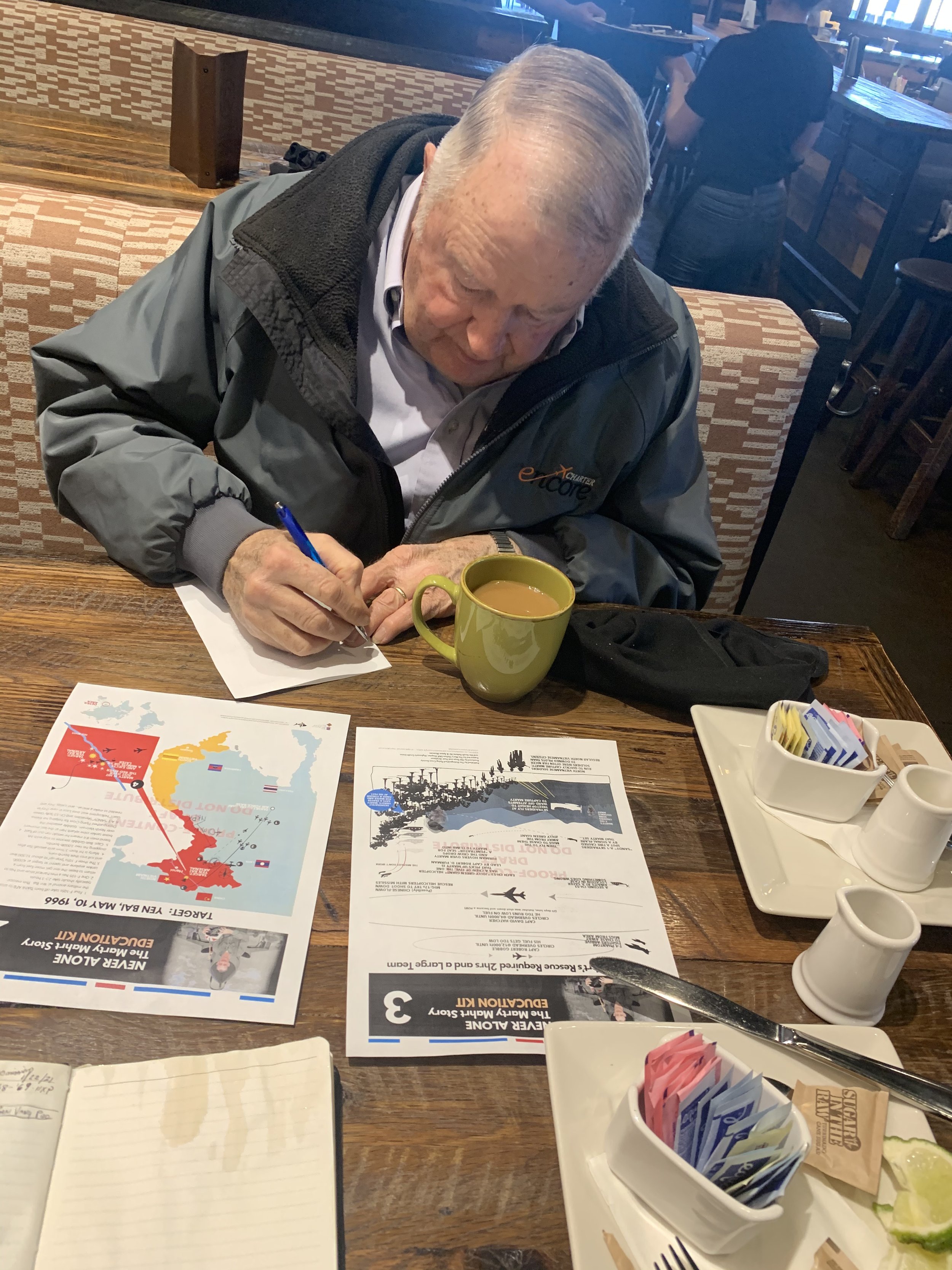 A-1 "SANDY" pilot Rich Hall helps validate a draft of a DFC Society "Educator's Kit"...