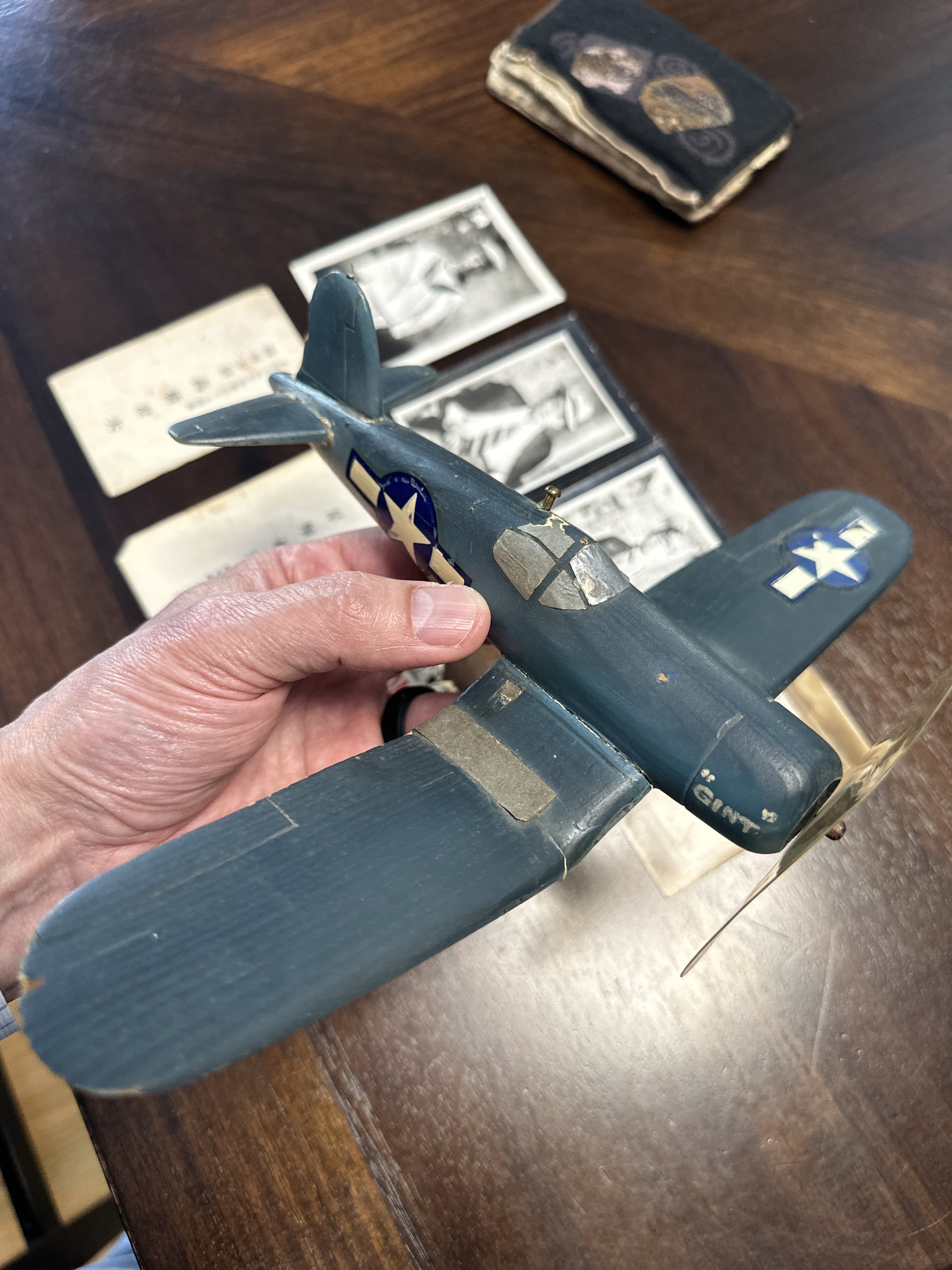 "Trench Art" c.1944 - a hand carved F4U Corsair, painted in real "Corsair Paint" by VMF-216 pilot Claude Hone. He made it for his dad!