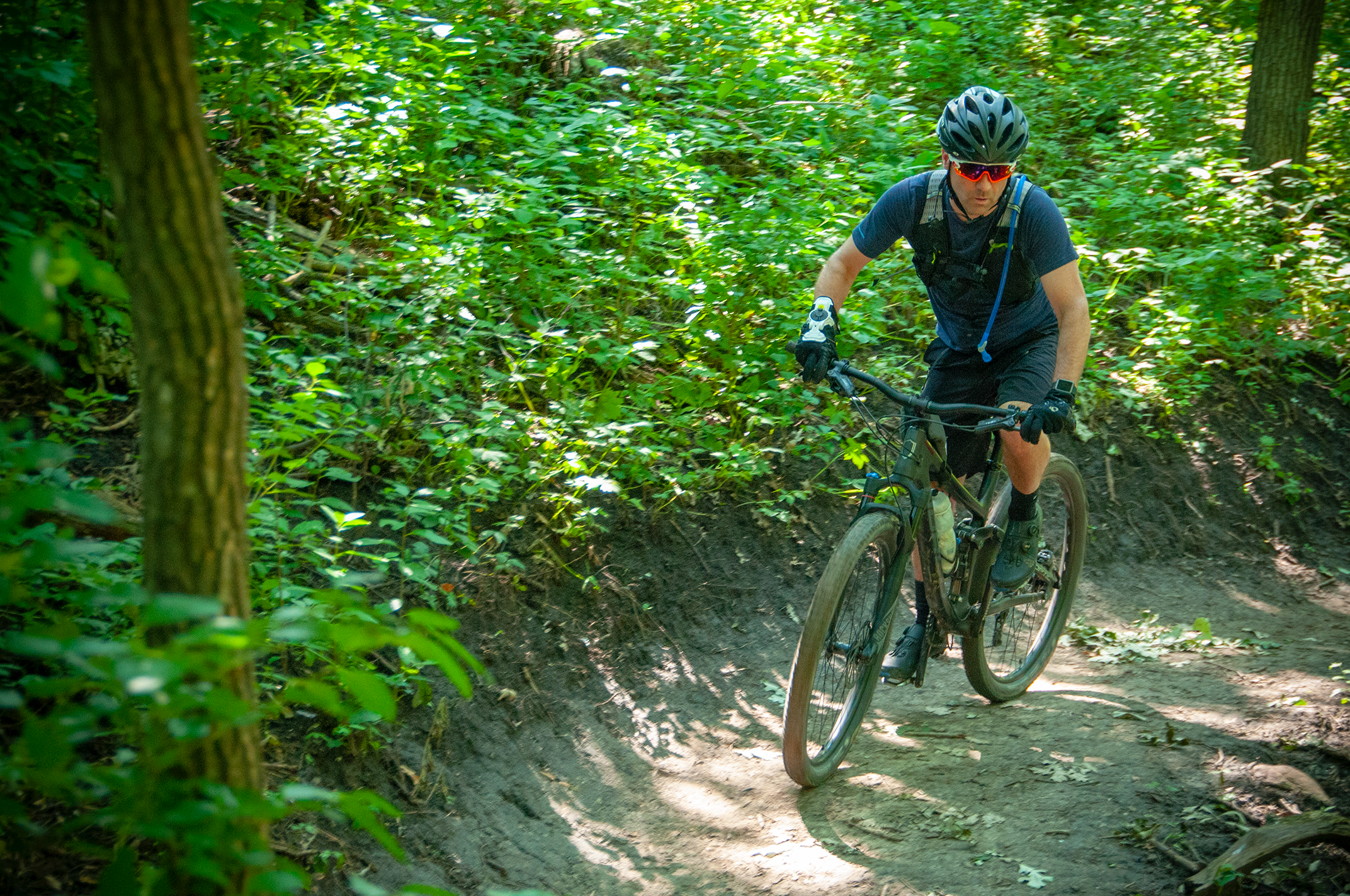 Photo of mountain bike rider on trail at Tuthill Park.