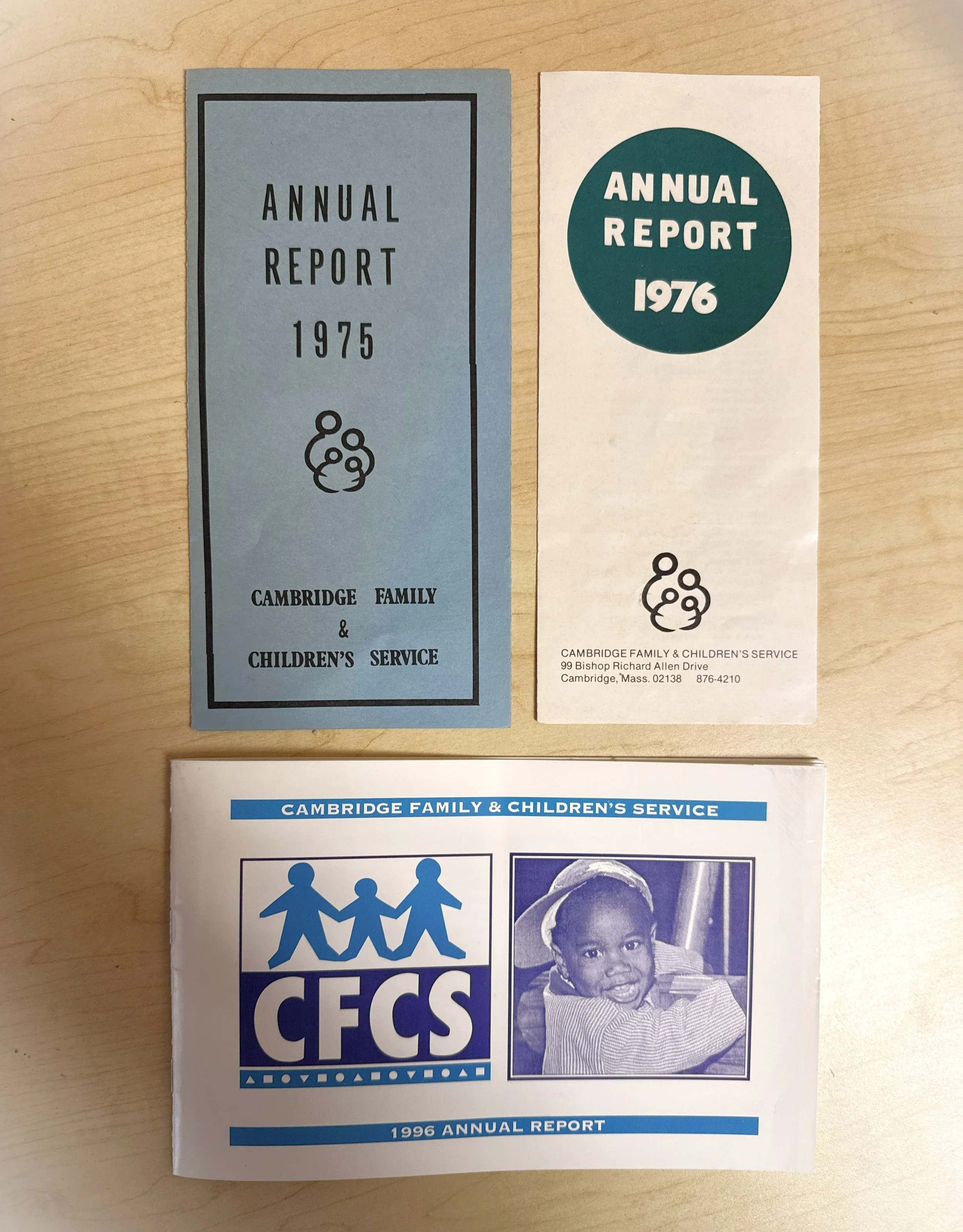 Annual Impact Reports from 1975, 1976, and 1996. Sharing our story and our impact with the community is a tradition that continues today.