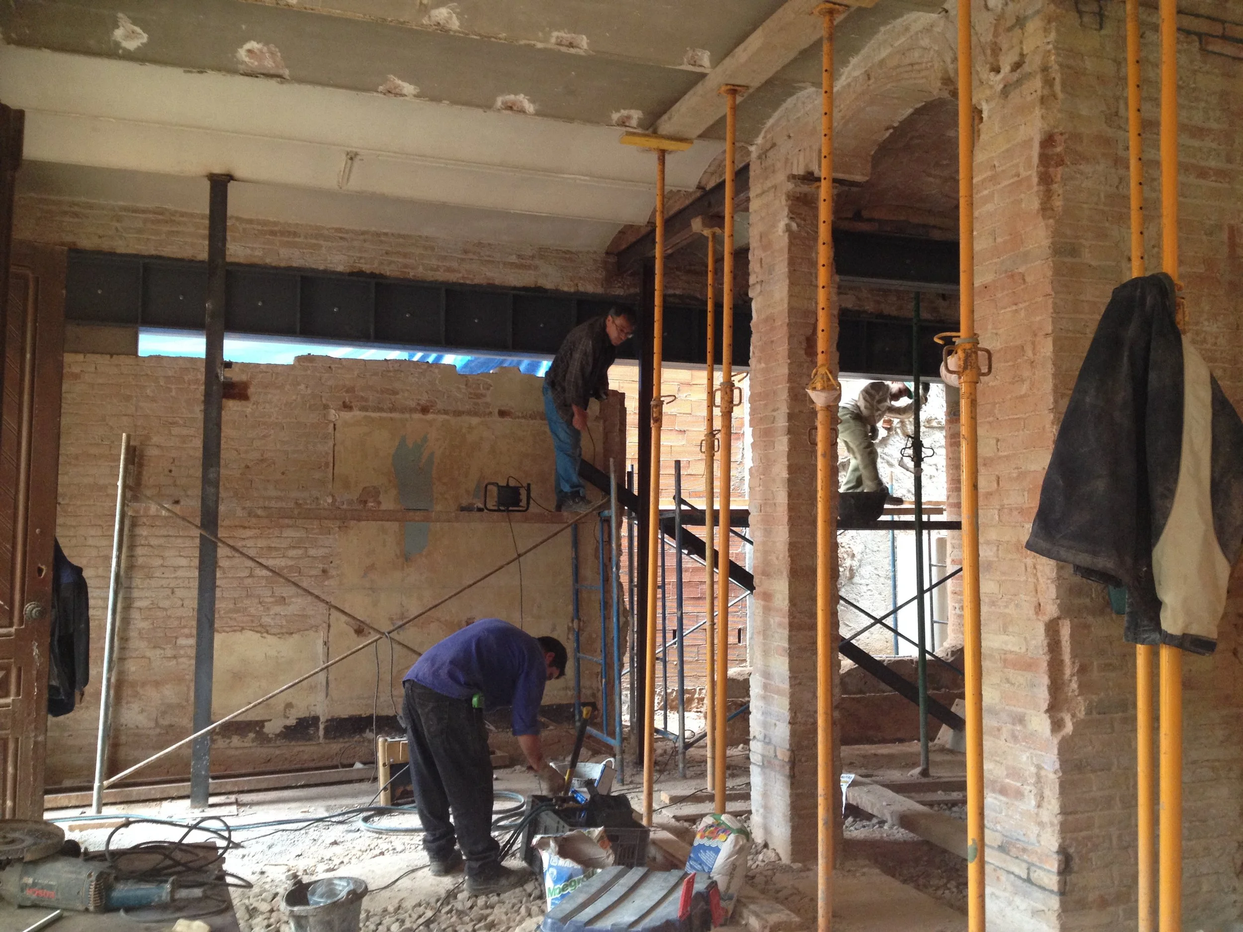Removing brick walls under the beam