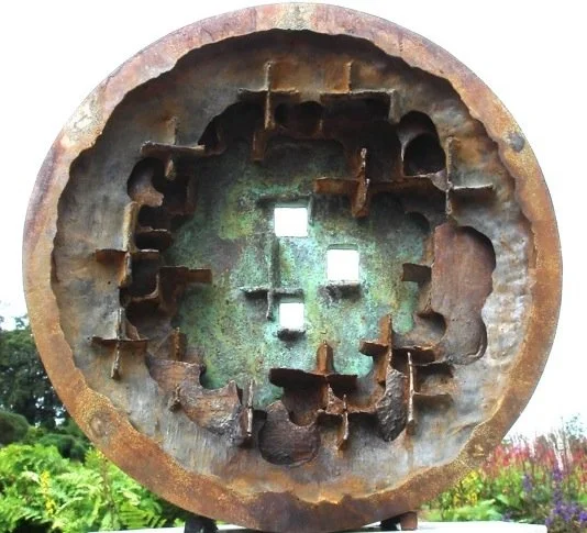 Reinventing the Wheel- iron and marble resin 45cms high