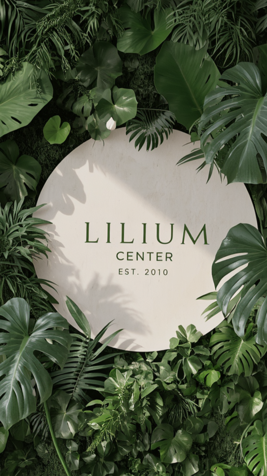 Green and dark green geometric hexagonal logo with layered chevrons