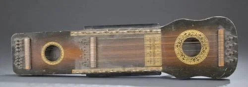 Close up of a ukelin instrument.