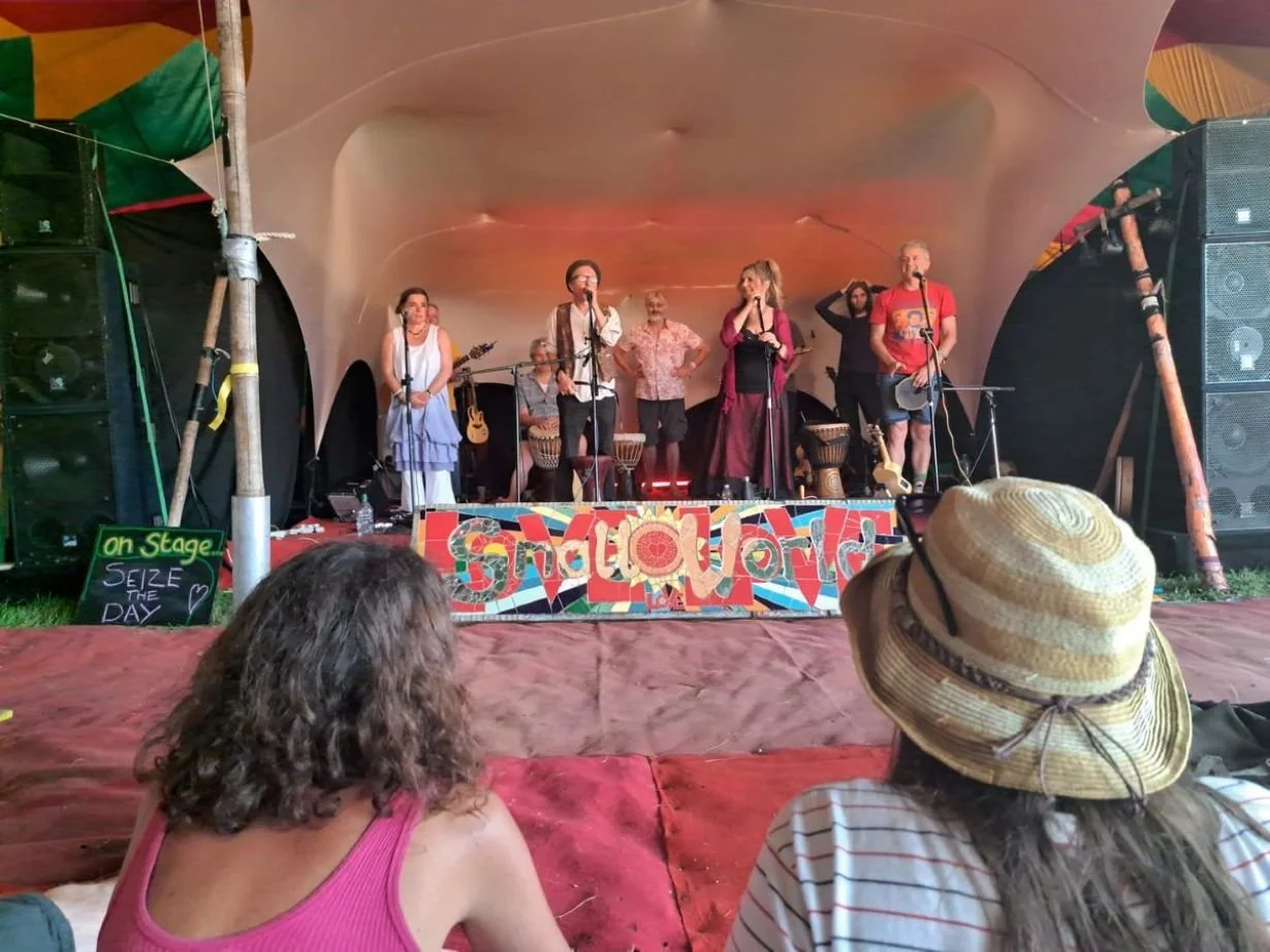 Ukulele band playing at music festival.