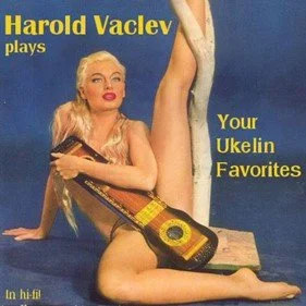 Lady holding a ukelin.