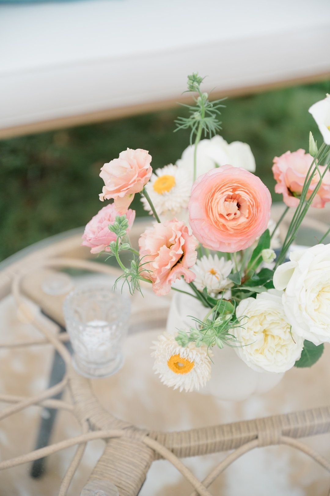 Bigger isn't always better! Delicate &amp; airy florals in small vessels can still offer a big impact!  This couple reserved the large statement florals for their ceremony (&amp; photo opp) design. The tented cocktial recpeiton was just as beautiful 