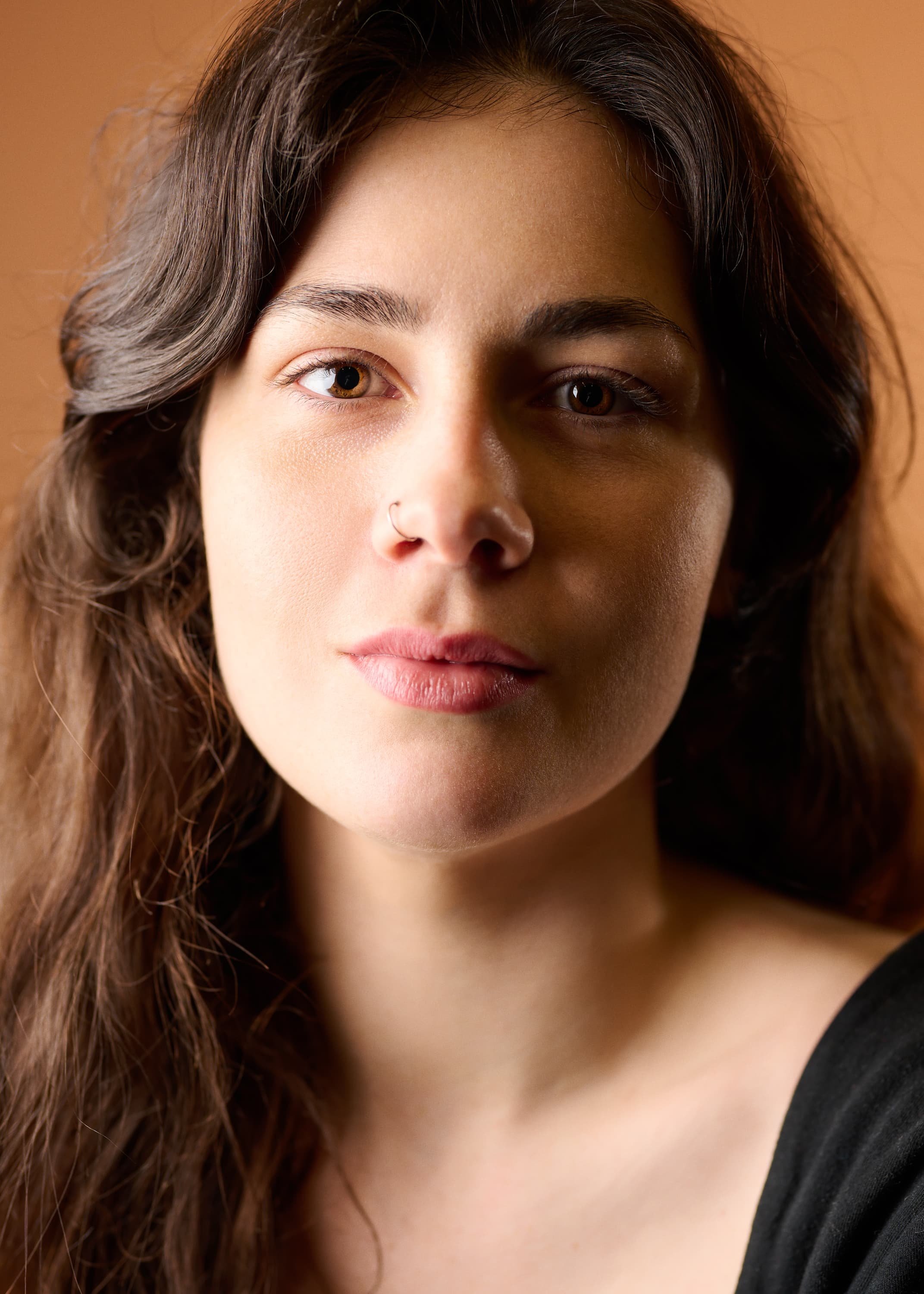 Colour portrait of a woman looking into the camera