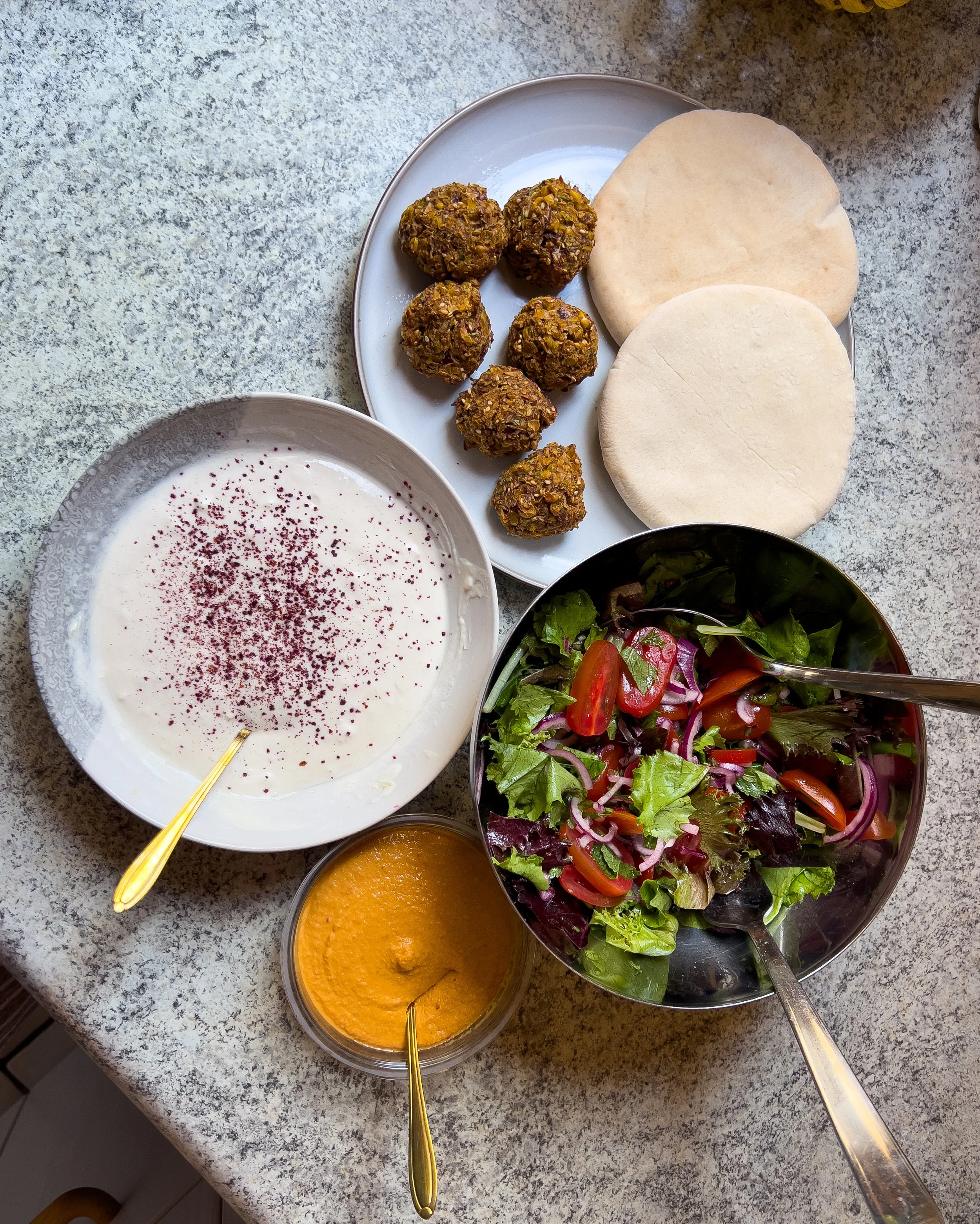 Sweetcorn Falafel Pitas with Tahini Yoghurt, Fresh Salad and Hummus