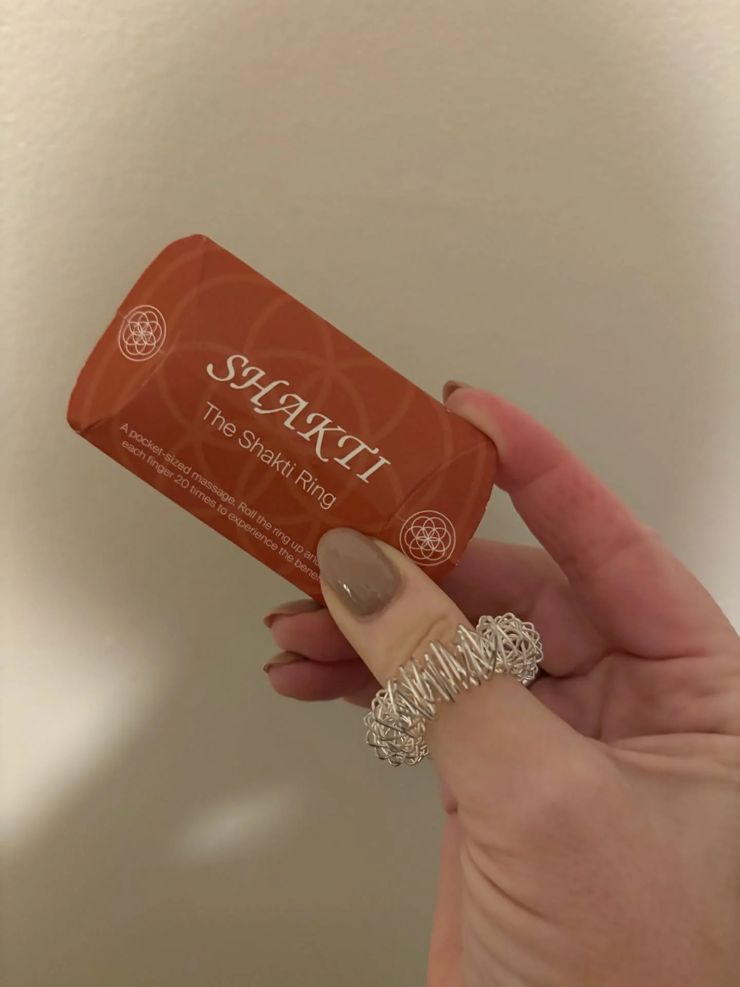 While Lynn is taking a break from teaching our Thursday evening Yoga Nidra classes - she will still be practicing nidra, tuning forks, and de-stressing with acupressure!

Here she is modeling one of her favorite apothecary items - the small but might