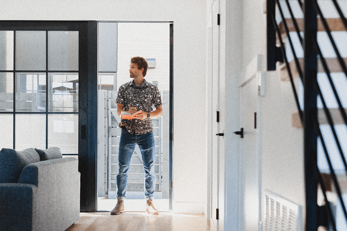  A detail photo of a man making a detailed checklist. If you're looking for the best home concierge in Colorado to help you upgrade and maintain your home, WillowHome is here for you. 