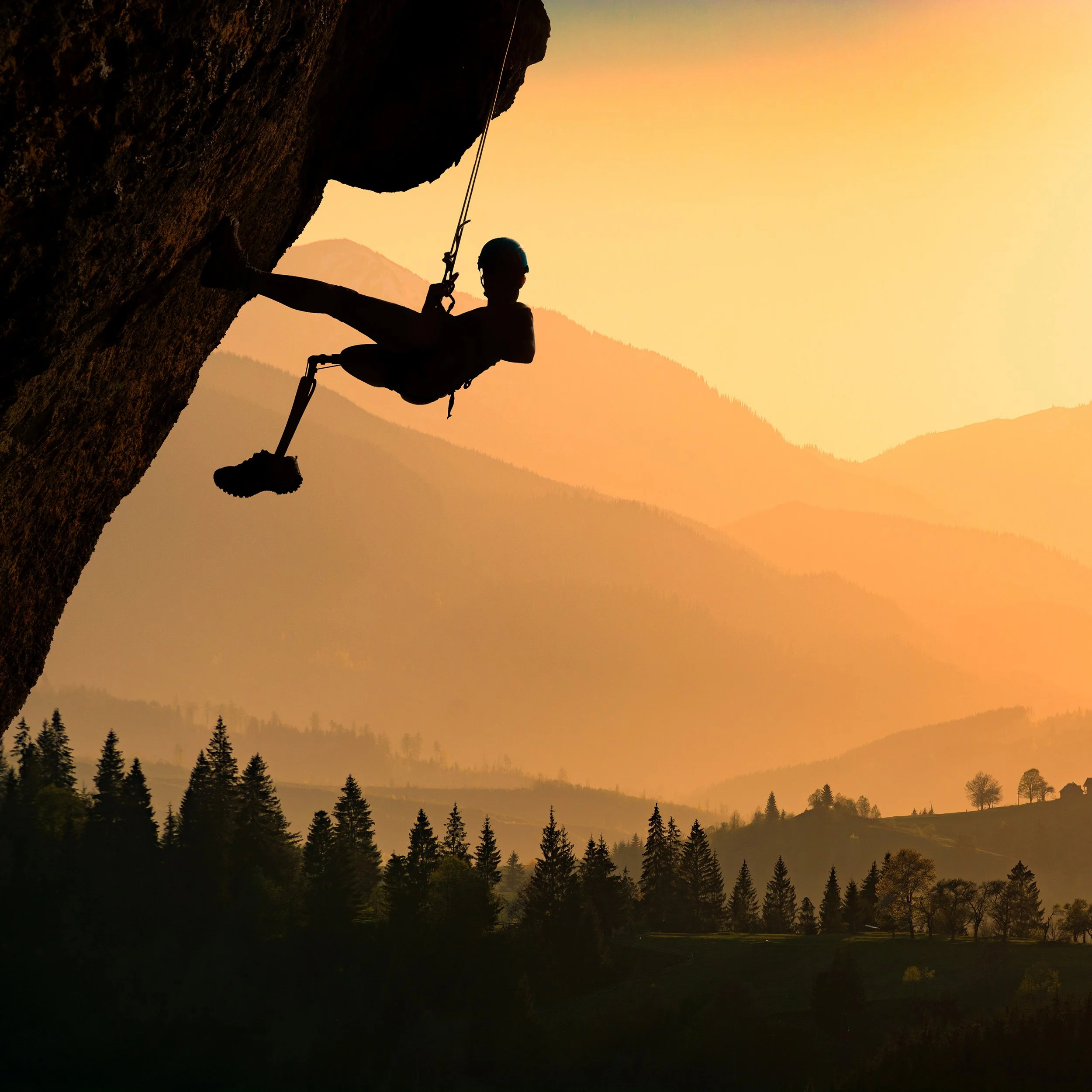  A rock climber with a prosthetic leg descends a rock face in Boulder, Colorado. 