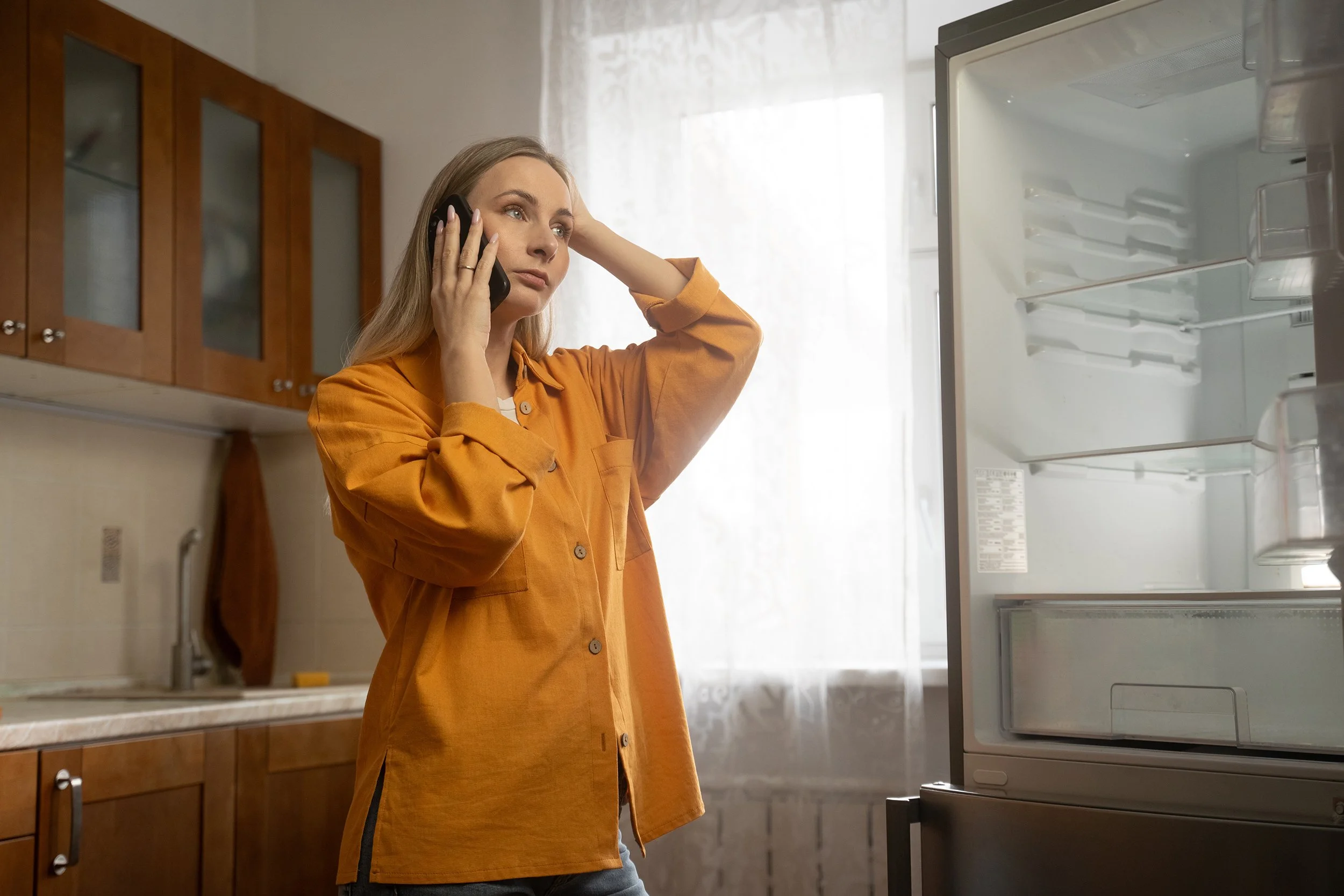  A couple sits in their new home together amid moving boxes. If you’ve just bought a new home in Boulder, check out our new homeowner’s survival guide for everything you need to know about local regulations, wildfire mitigation, and seasonal maintenance. 