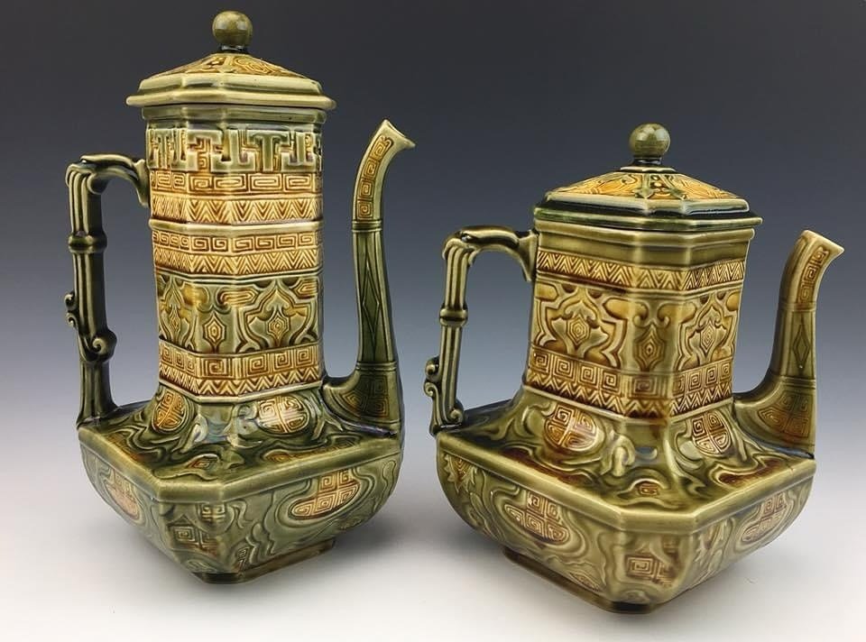 Exotic, Chinoiserie design majolica glazed ceramic coffeepot and teapot set. Made by Choisy-le-Roi Pottery, France circa 1880s.

The Drake Hall Collection