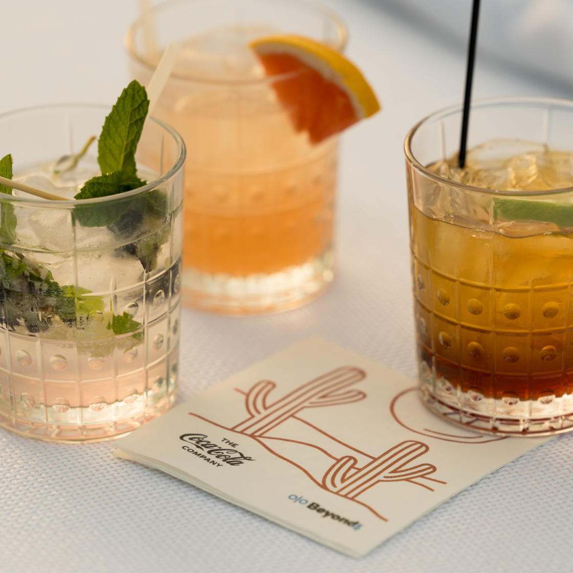 Custom event drinks photographed with custom branded napkin
