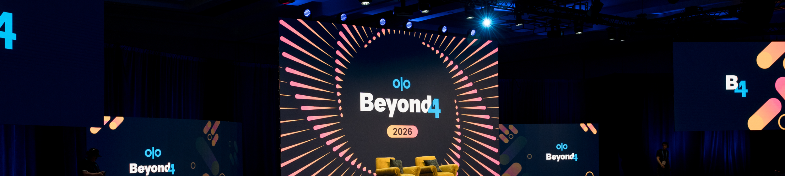 Beyond 4 stage with a swirling background