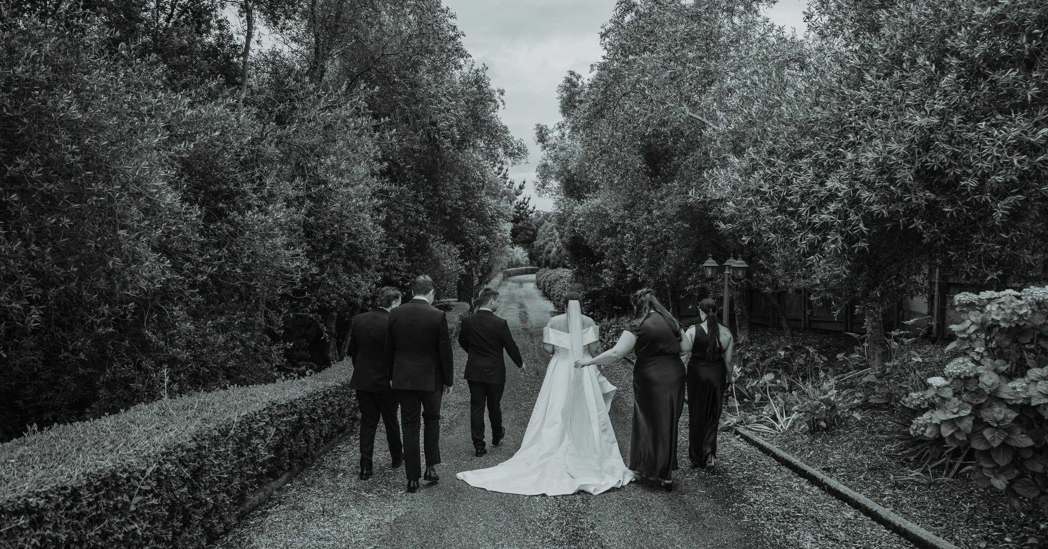 When you are looking at venues, notice the driveways.

Long, tree lined or structured driveways create natural leading lines and give you an easy, consistent spot for portraits. As long as they are wide enough for the full bridal party, they work bea