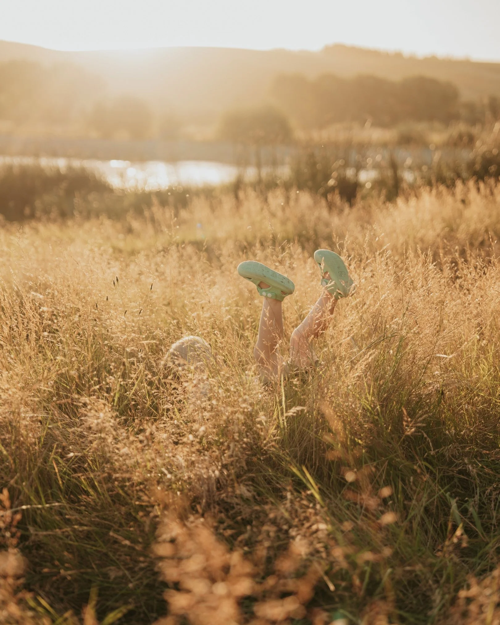 If I can encourage you to do one thing at your family shoot it would be this: Let the kids lead. 
- If they want to run about and be silly - join in! 
- If they want to sit down and have snuggles - lap up every beautiful second!
- If they are not tha