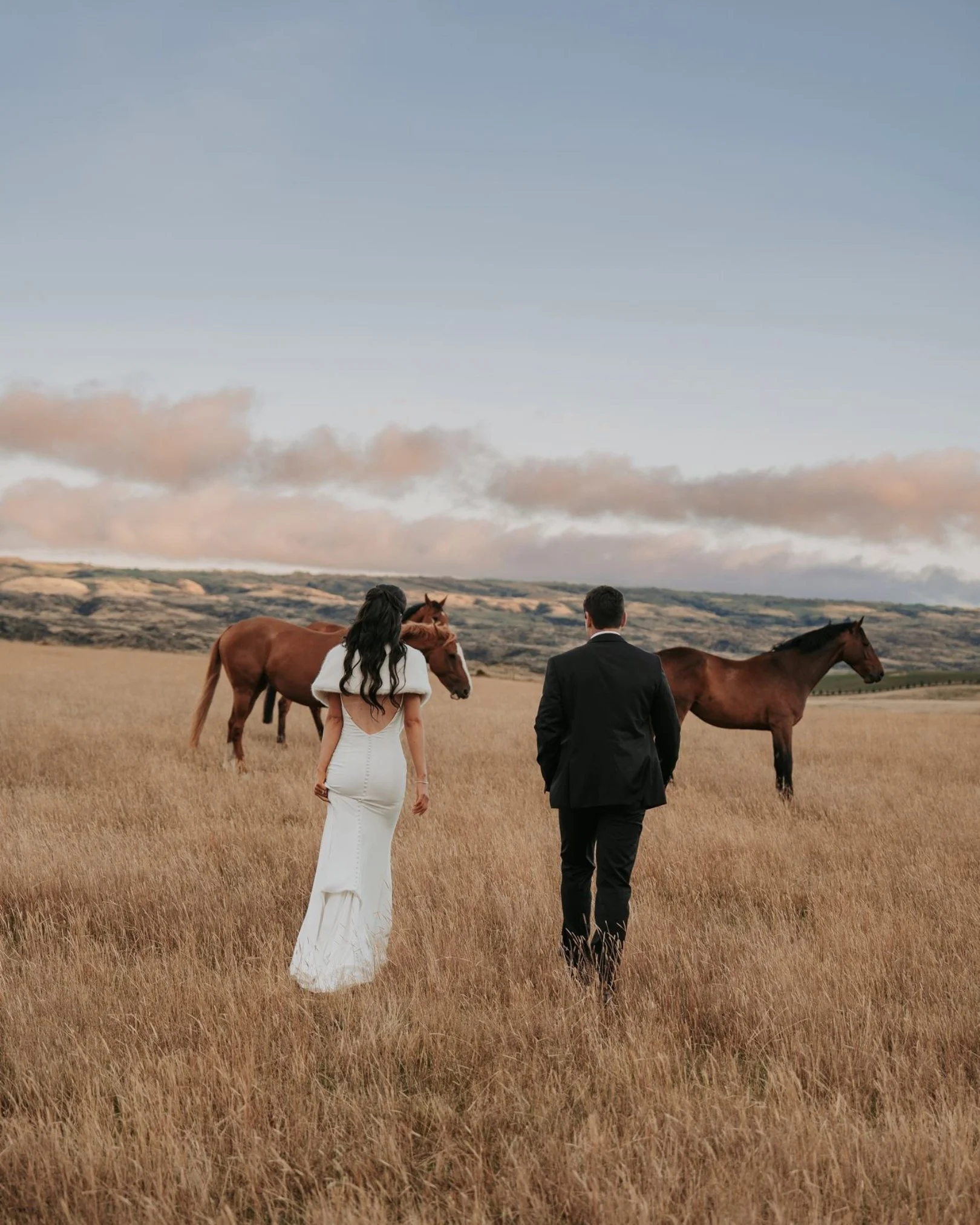 If there is something special to you and your day, there will be a way to make it work. 

Tori's Dad brought her horses all the way up to Middlemarch to hang out in the paddock opposite their wedding venue, all just for these moments. These slower pa