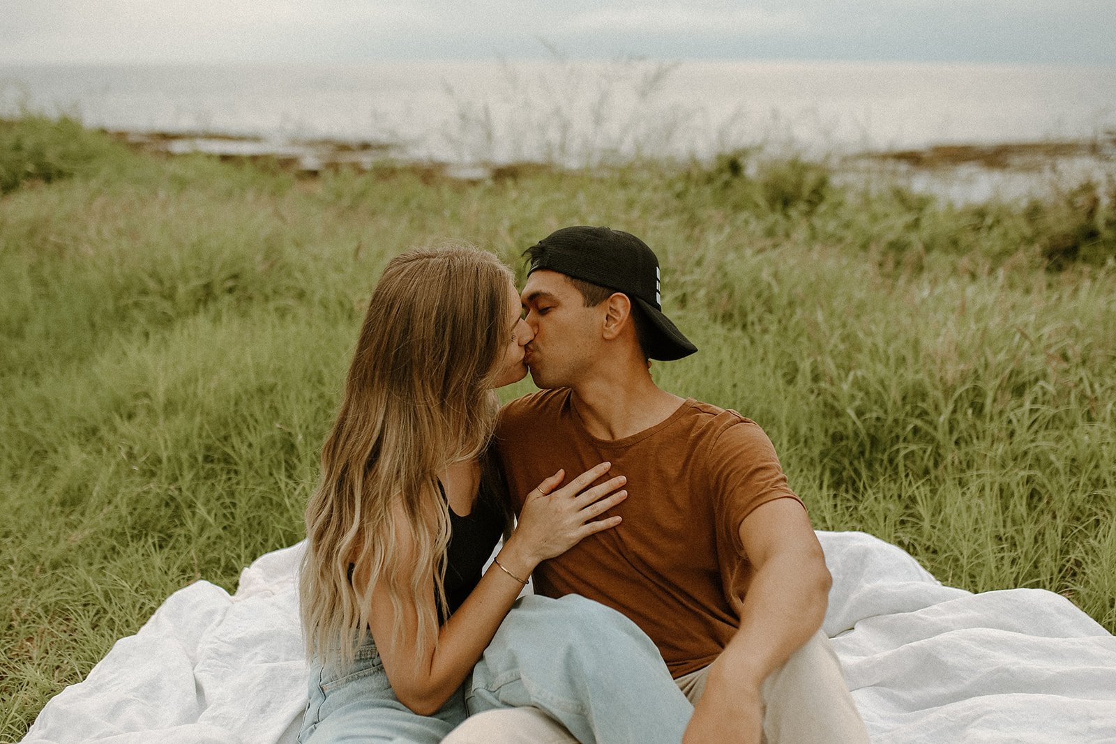 Hayley and Christian's coastal couples session at Makua Beach in Oahu, Hawaii