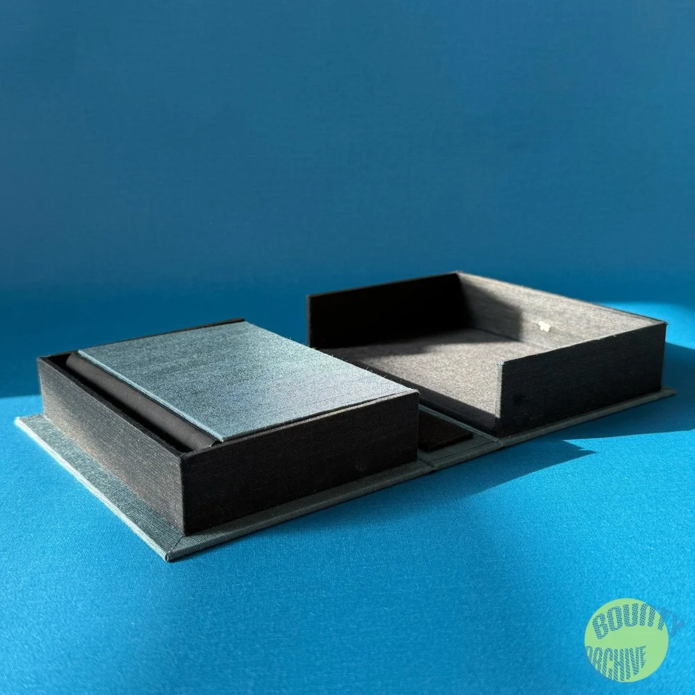 Open Clamshell Box with book.jpg