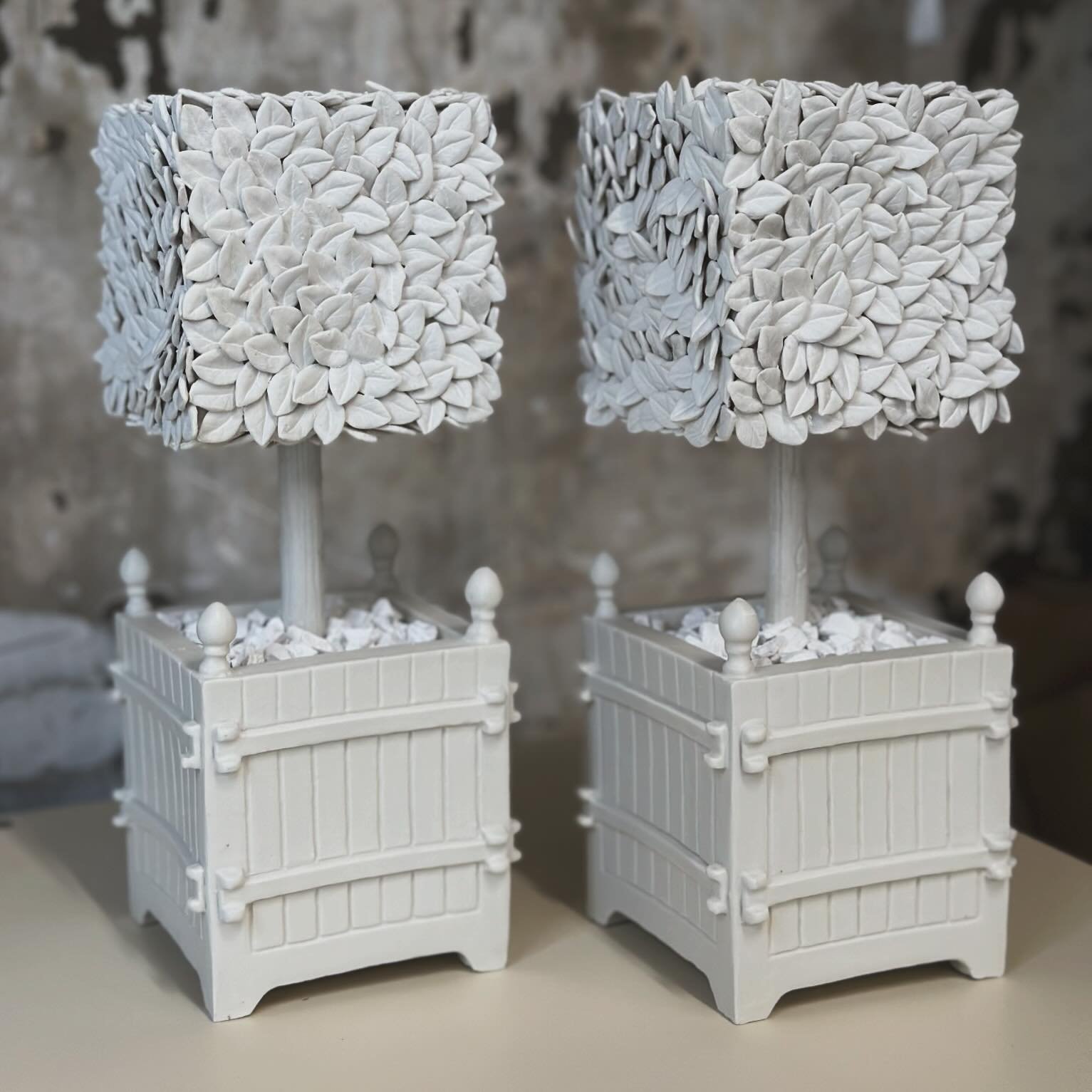 Pair of Versailles style planters with cube topiary heads. Inspired by the beautifully trimmed ones @ritzparis 

White English Porcelain 
2024
Available @lizobriengallery