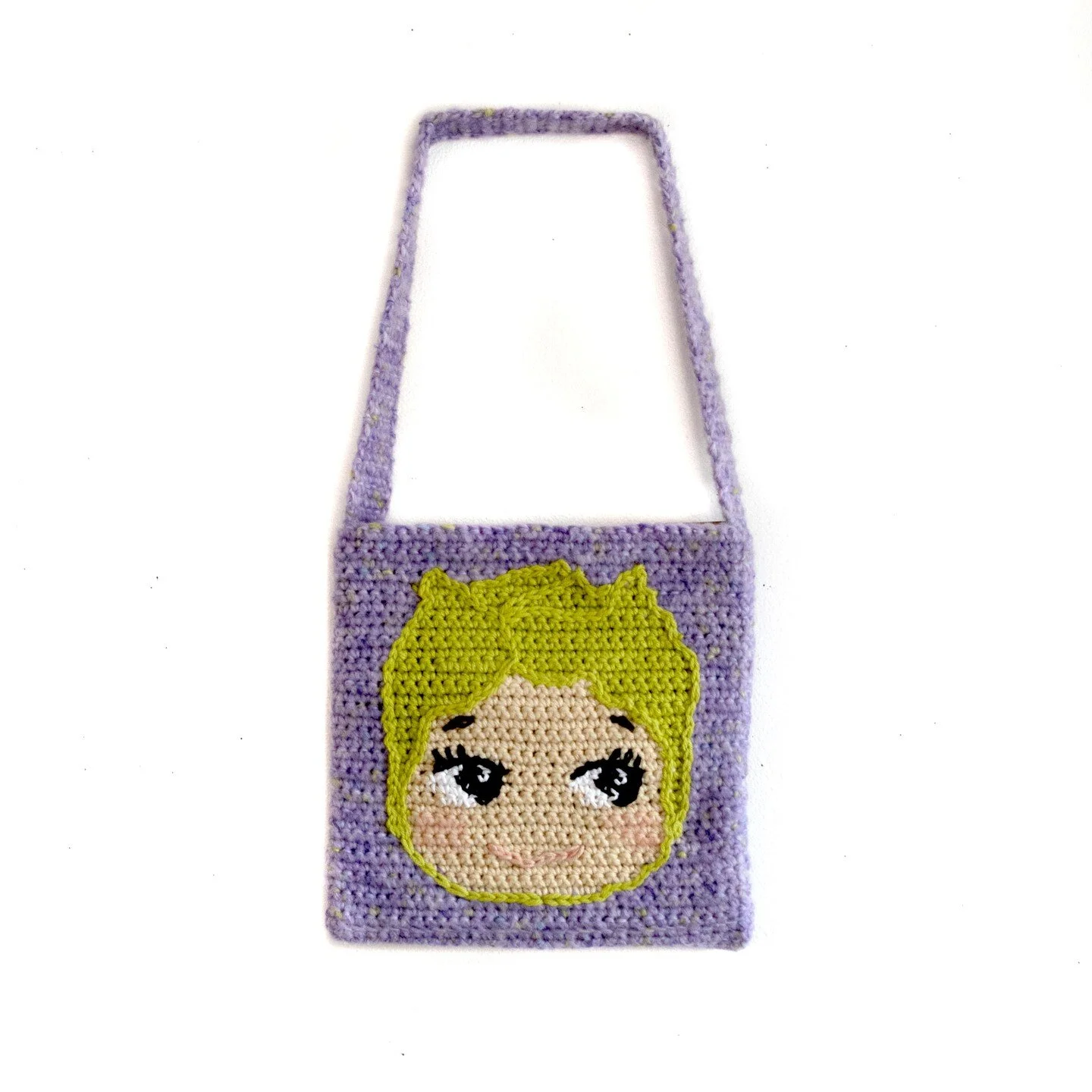 very much inspired by @alexandrasthings kewpie i made a lil bag with a surprise on the back!

i am still working on a paper doll kewpie tapestry but was really struggling so decided to flip to something easier and make this :-)

also can you tell the