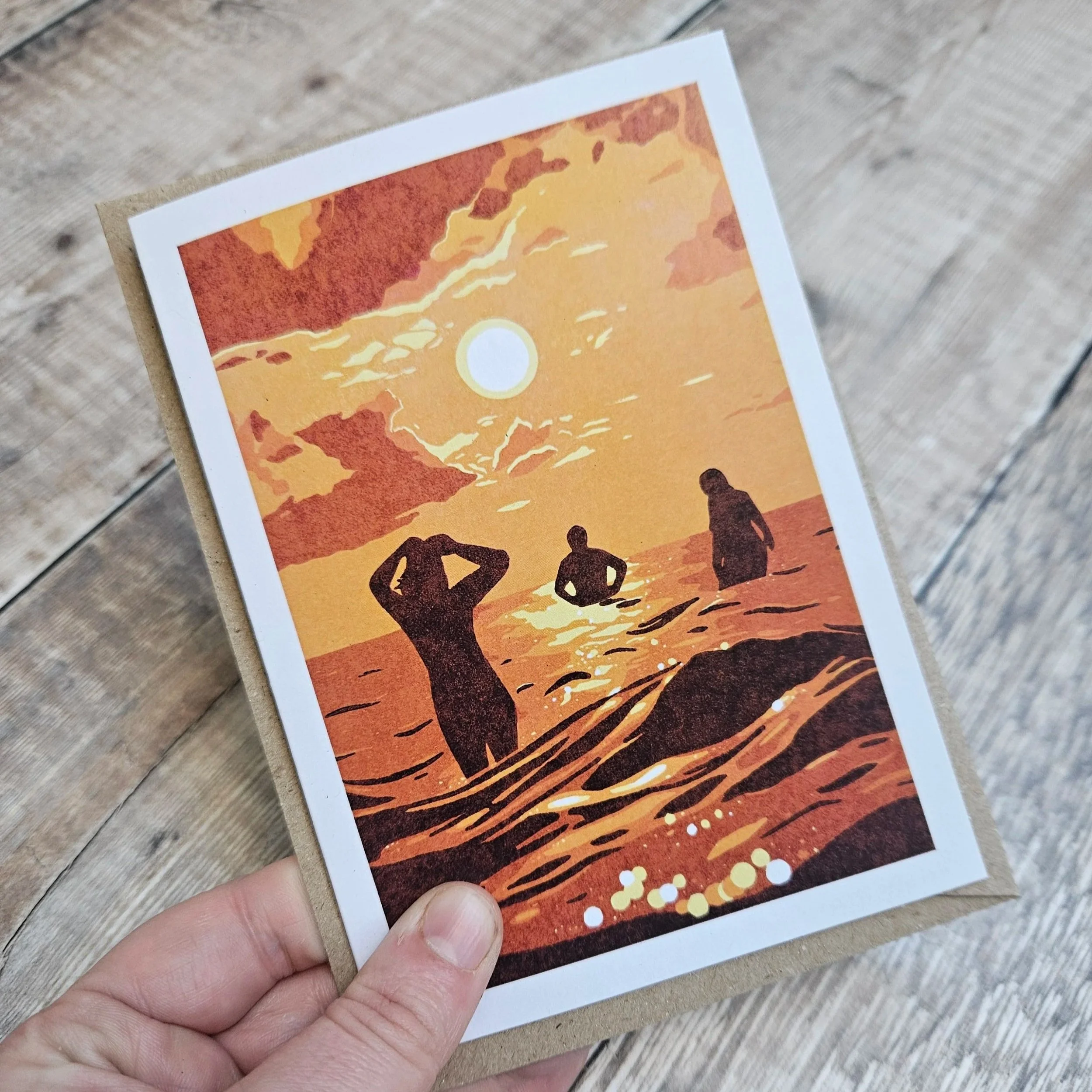 Illustration of three people swimming in the ocean during sunset with a cloudy sky.
