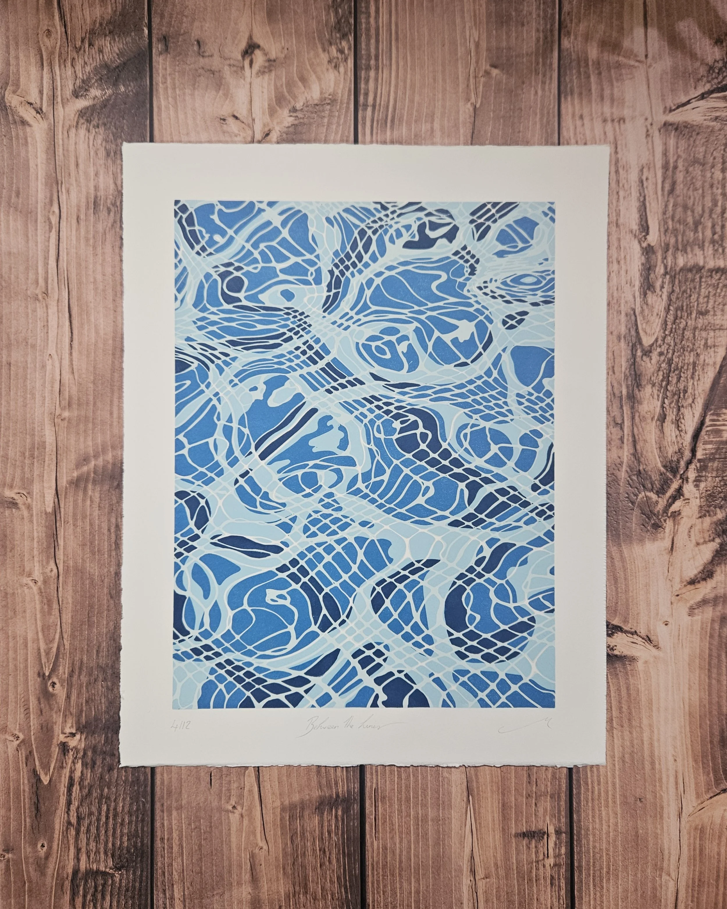 Between the Lines Reduction Linocut Megan Hall.jpg