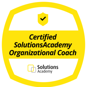 2023+SolutionsAcademy+Certified+Organizational+Coach.png