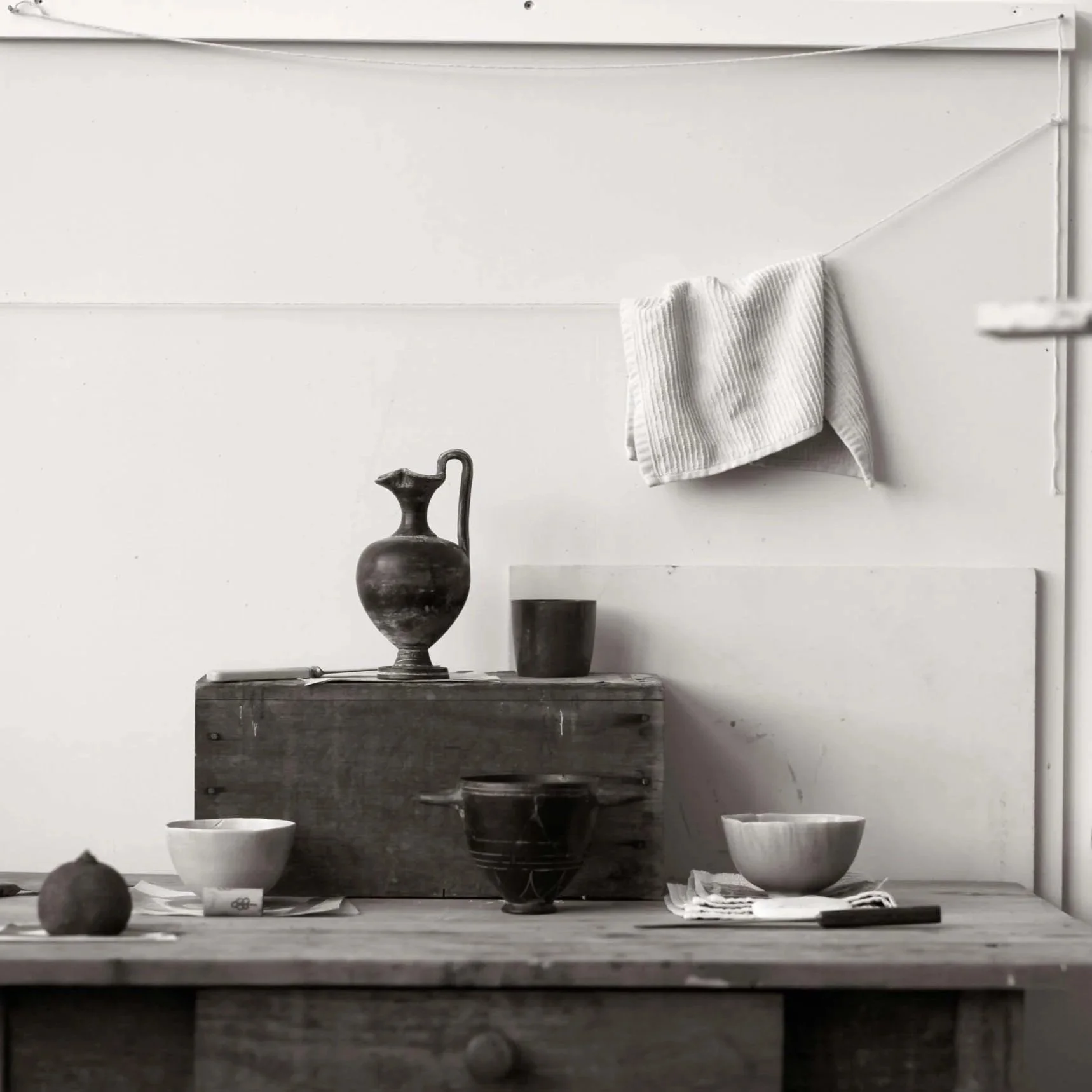 Artist's studio table of still life objects.