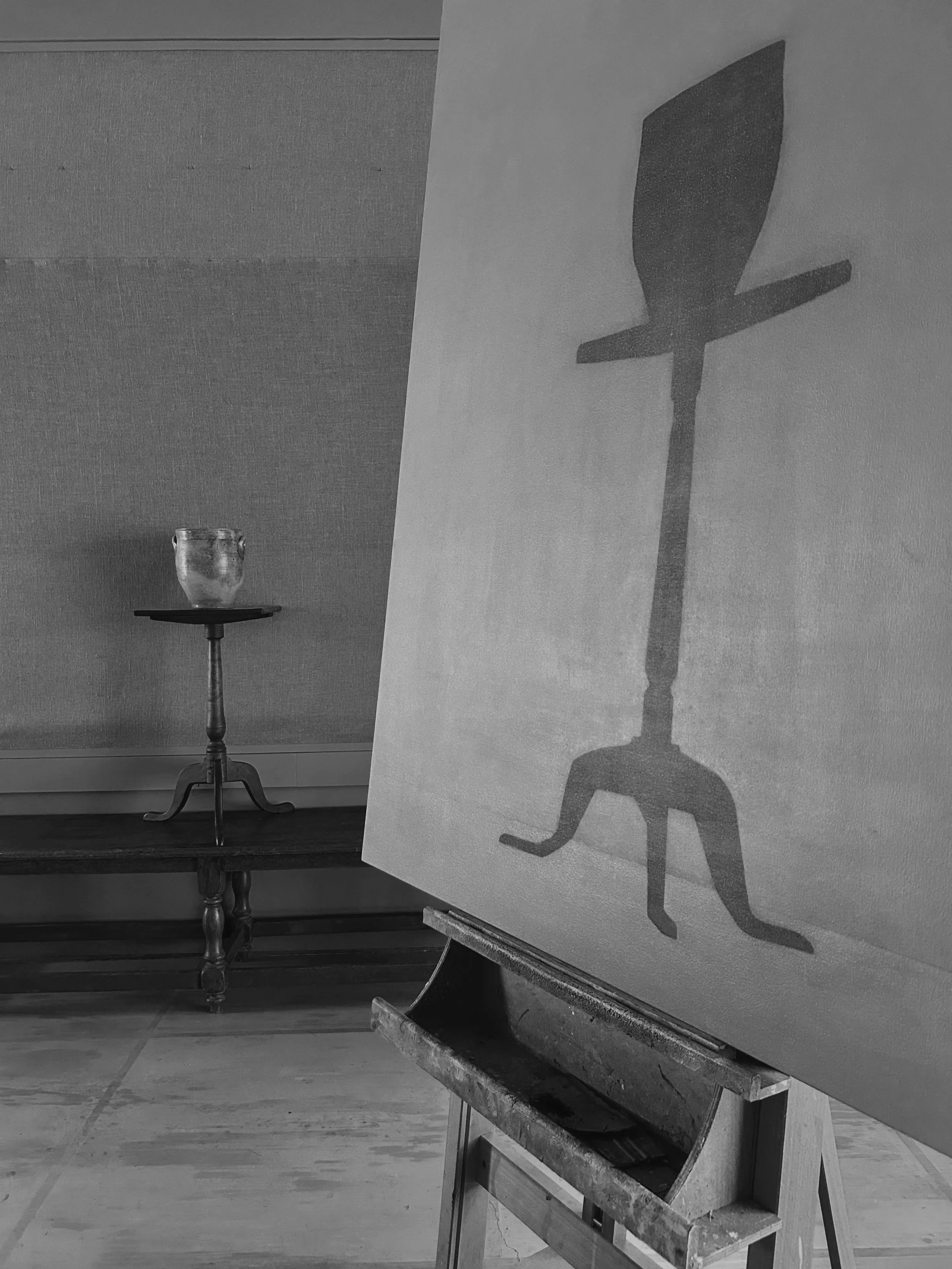 The artist's painting studio interior, easel and subject.
