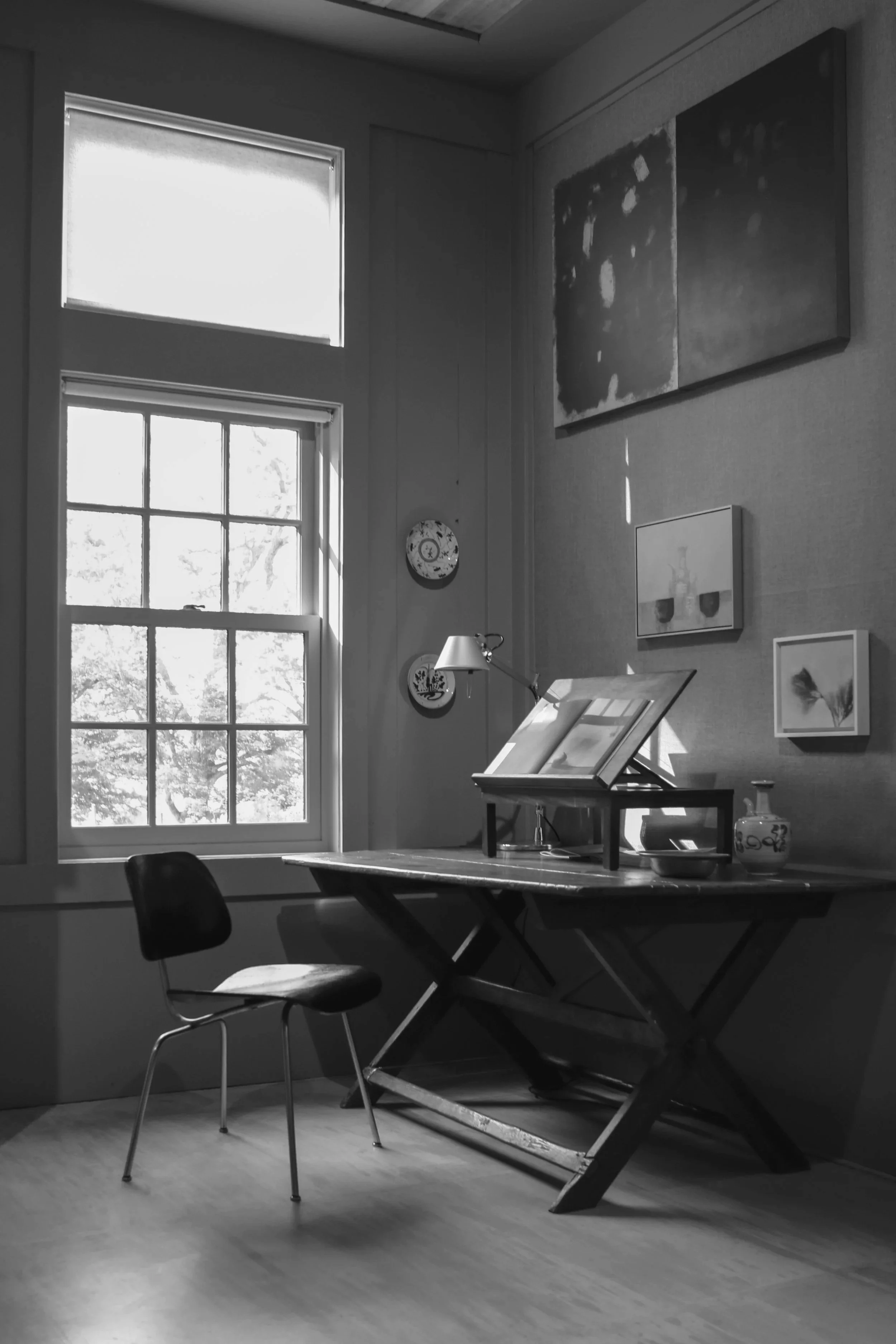 The artist's painting studio interior, desk for study.