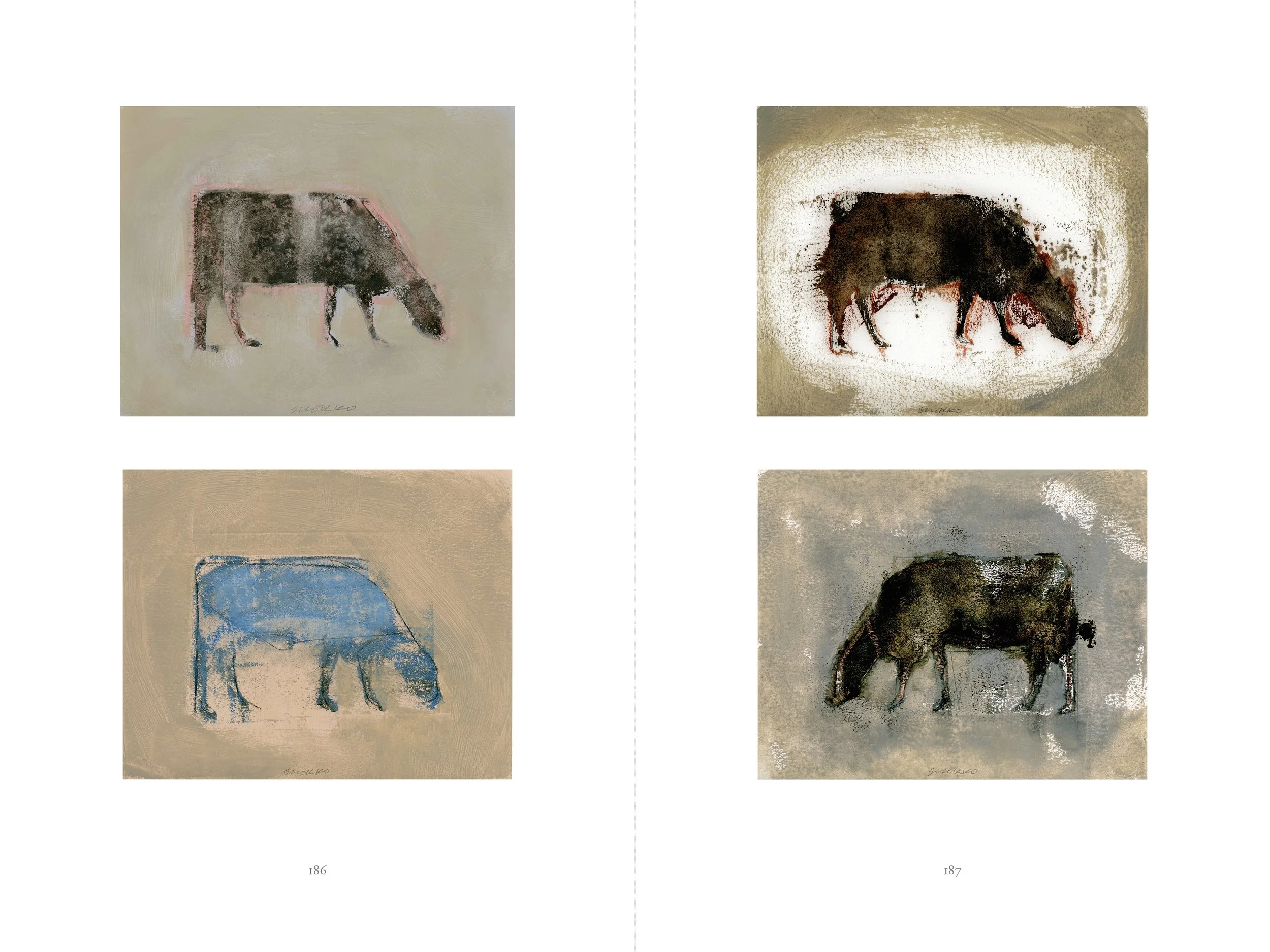 Book pages showing four paintings of cows.
