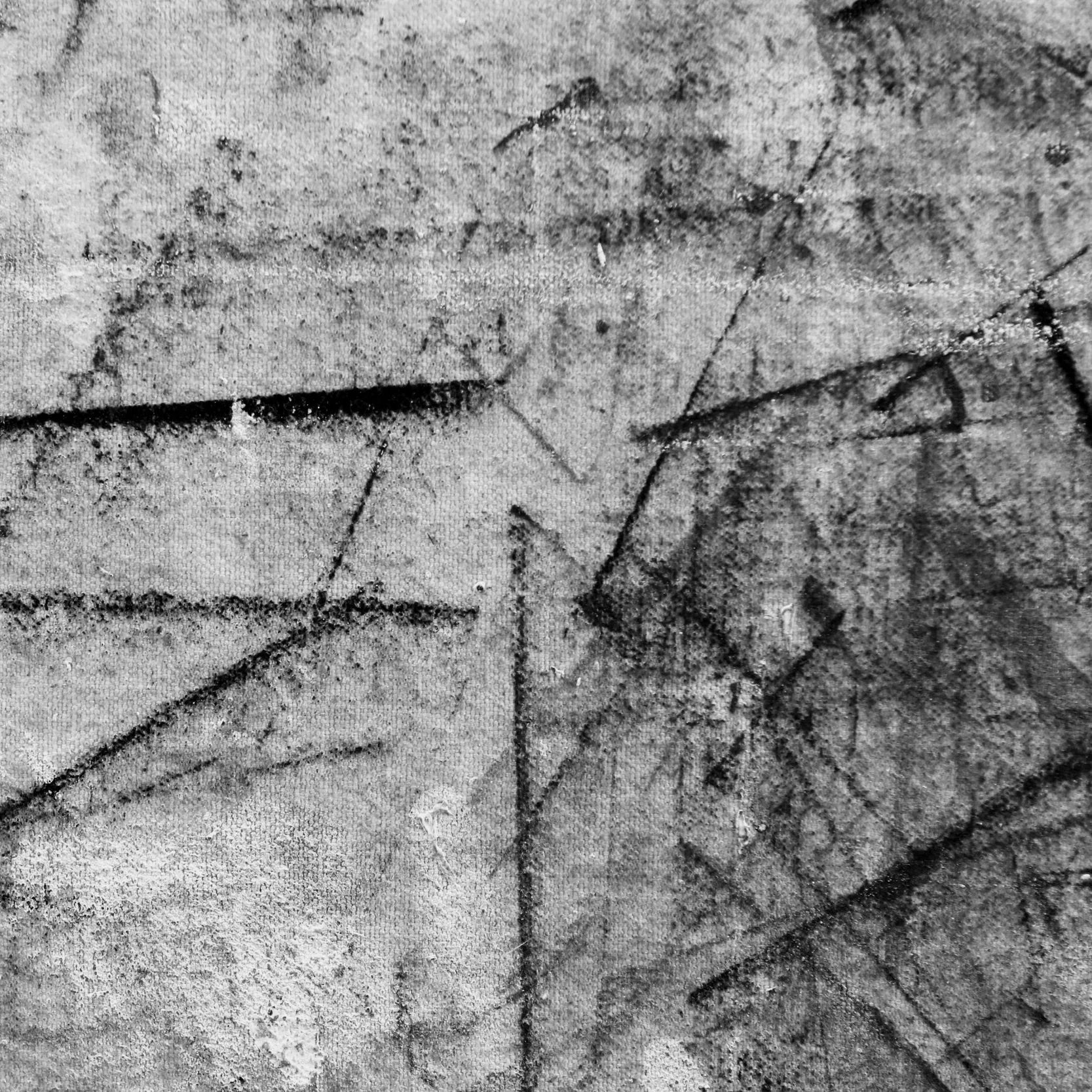 Detail of artist's work table with marks of oil paint.