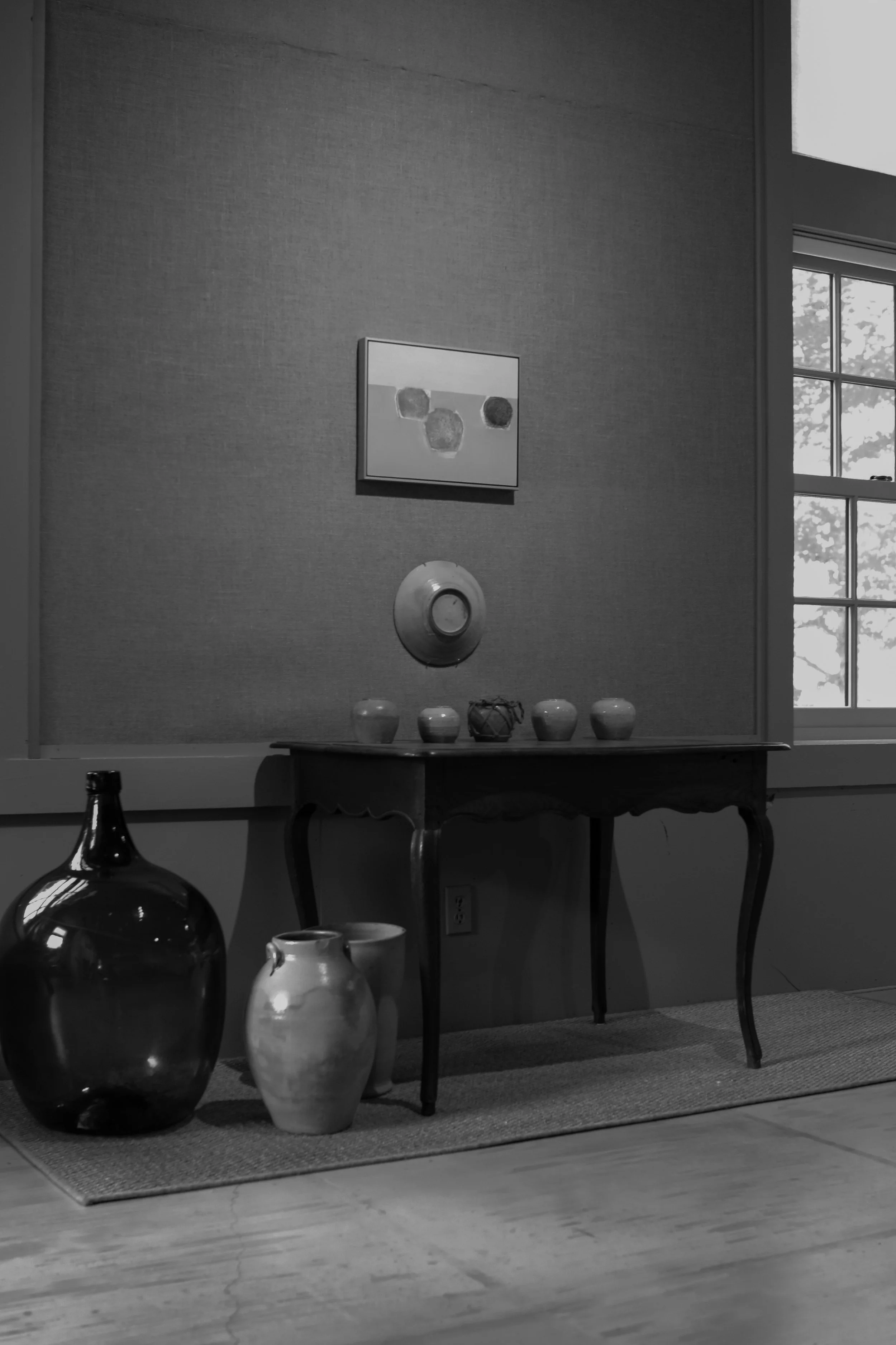 The artist's painting studio interior, painting on a wall.