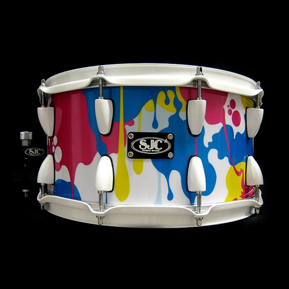 A blue, yellow and pink paint drip pattern designed by Laurie Shipley Design for SJC Custom Drums.